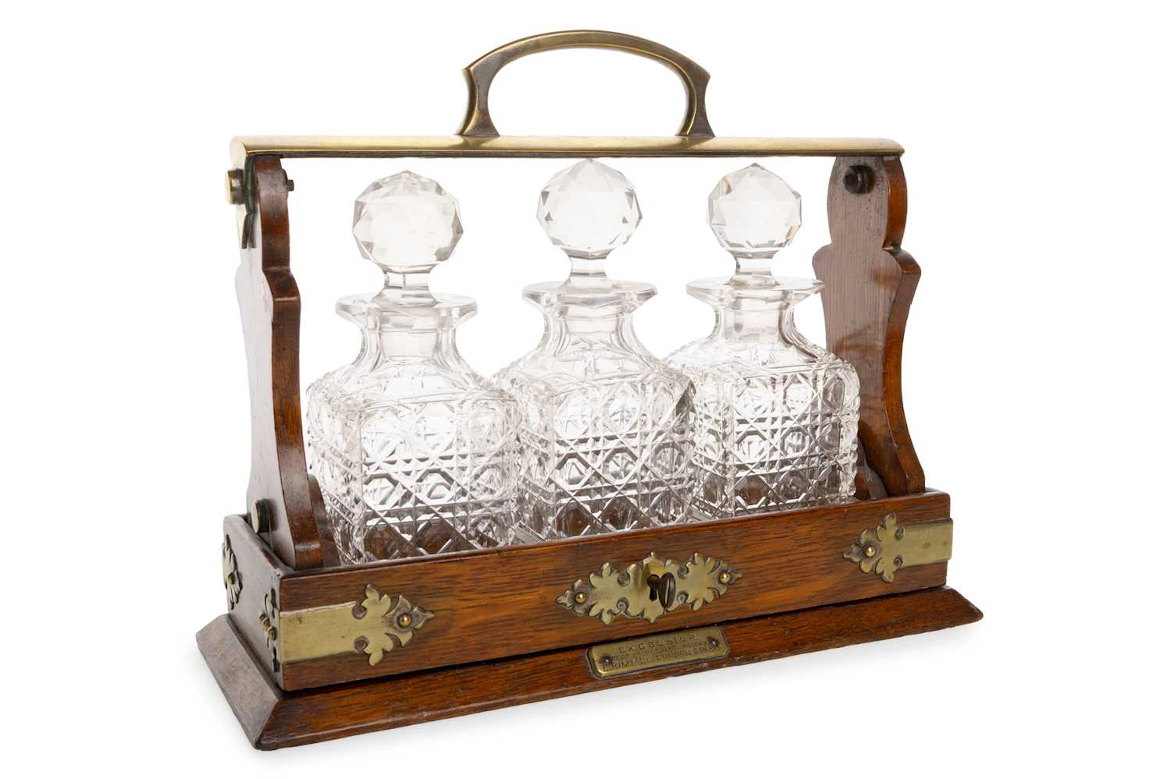 LATE VICTORIAN THREE BOTTLE PERFUME TANTALUS LATE 19TH CENTURY