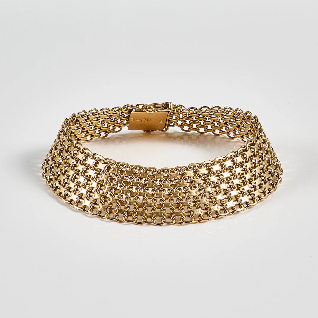 ARMBAND, 18 k, vikt 35,7 gr.
