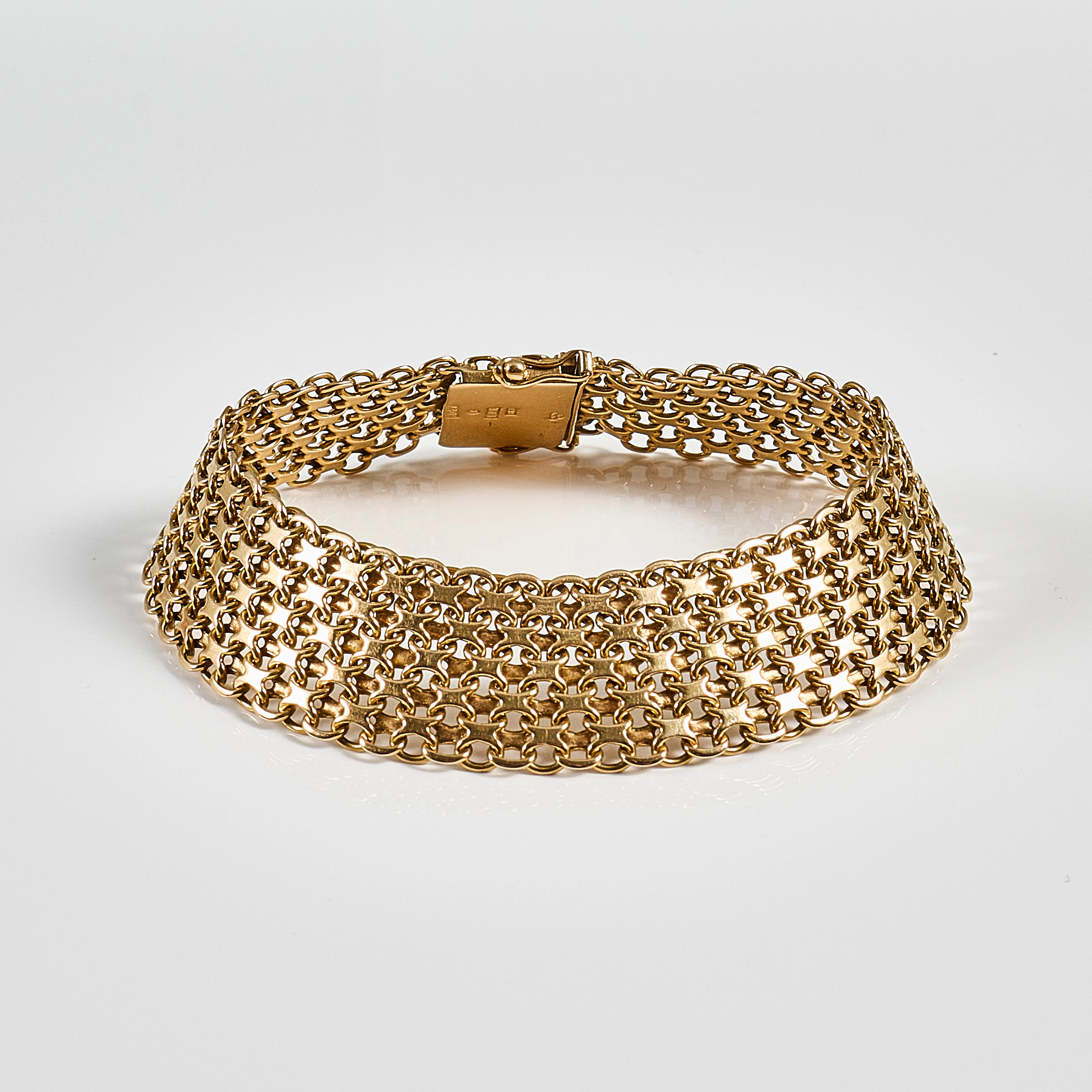 ARMBAND, 18 k, vikt 35,7 gr.