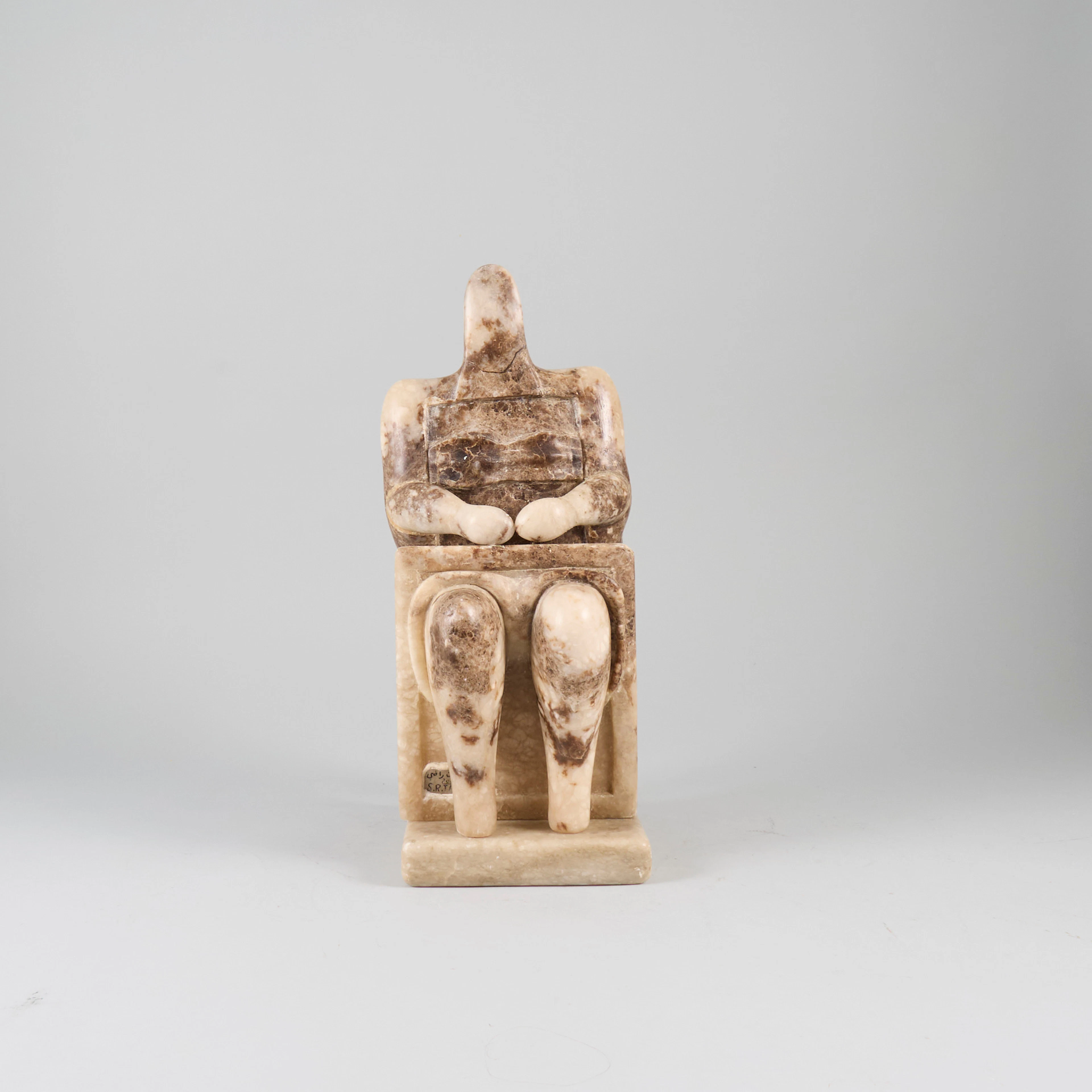 SALMAN RADHI. Figurin i marmor, signerad.