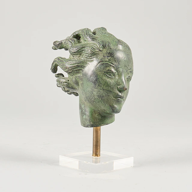 CARL MILLES. EFTER. Skulptur, "Änglahuvud". Skulptur i grönpatinerad
