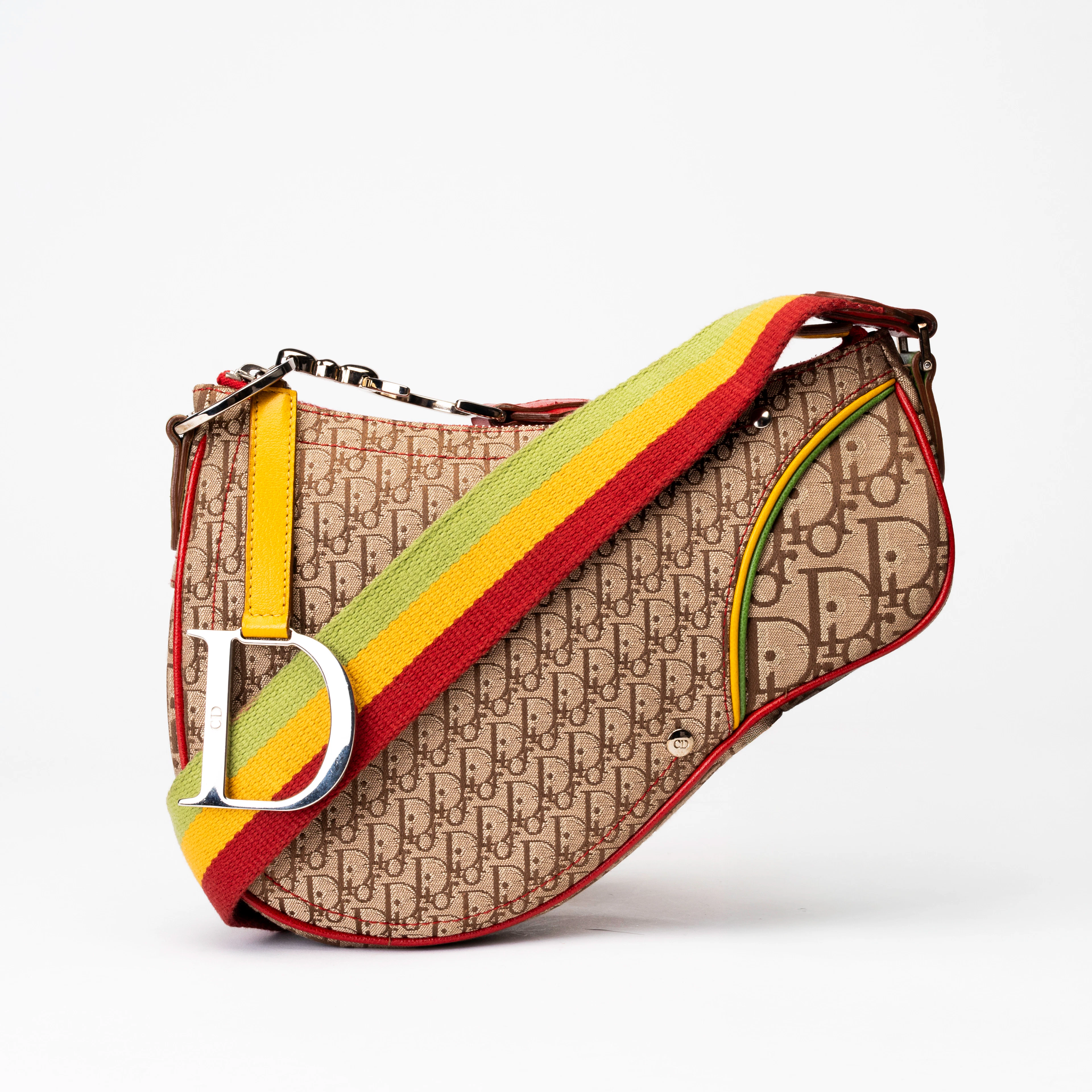 CHRISTIAN DIOR. Handväska, "Diorissimo Rasta Saddle Pochette", John