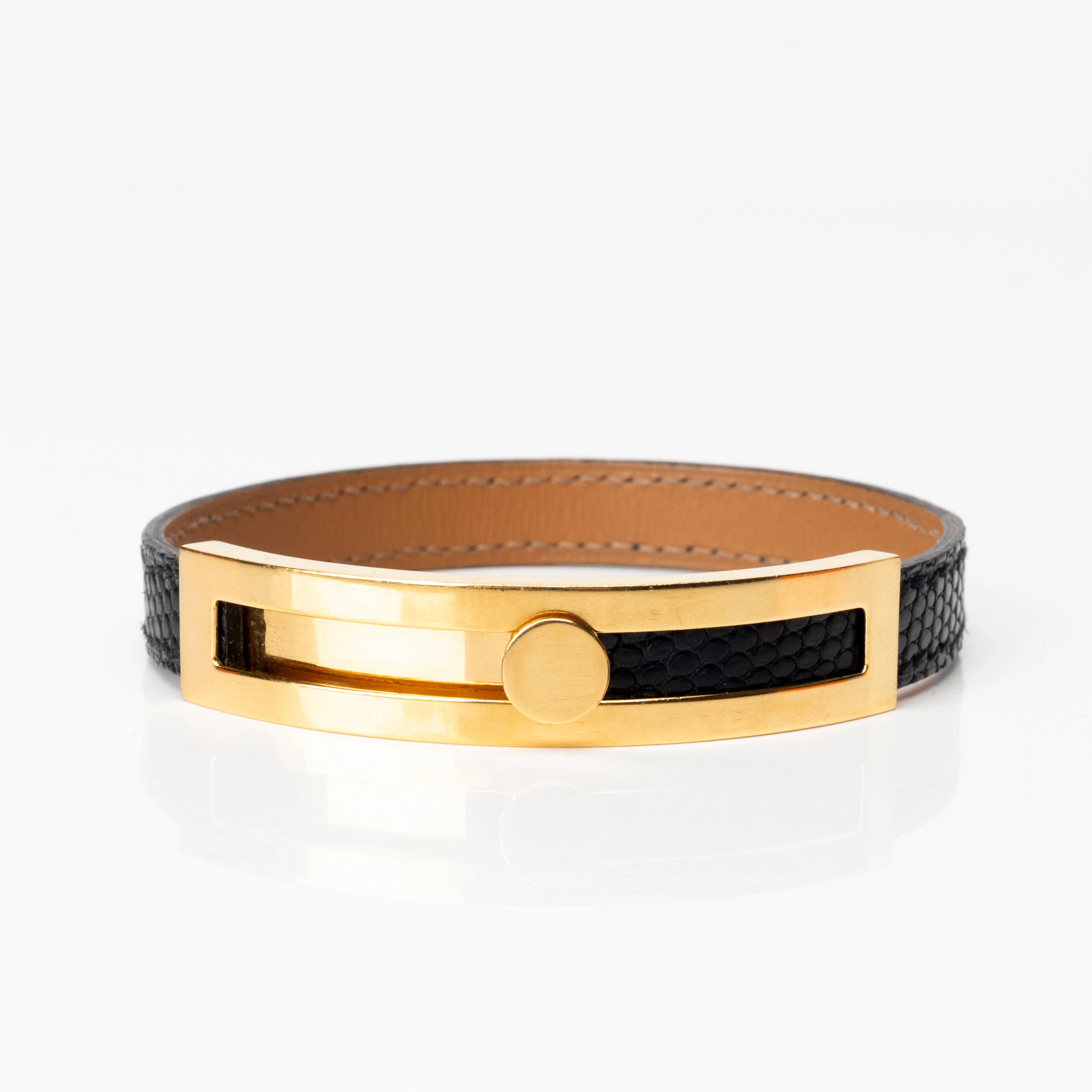 HERMÈS. Armband, läder och guldplätterad metall, "Pousse-Pousse"