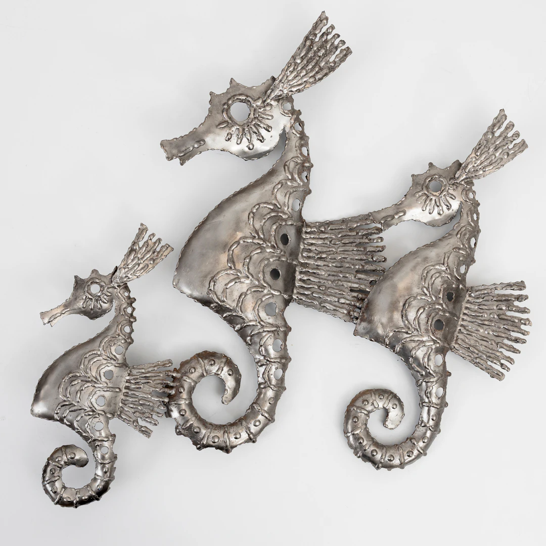 BENGT ROMIN. Väggskulptur, metall, sjöhästar, monogramsignerad, daterad 83.