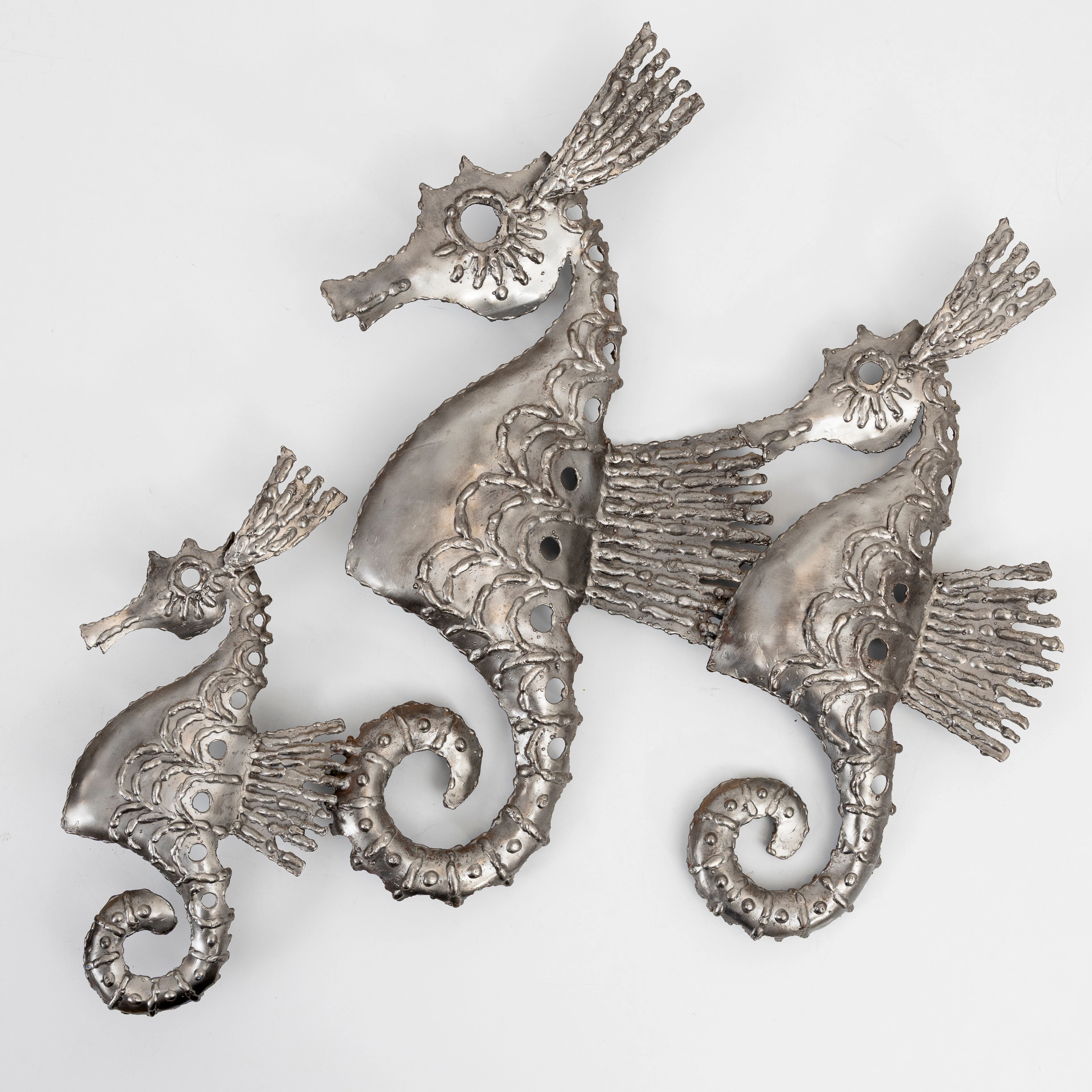 BENGT ROMIN. Väggskulptur, metall, sjöhästar, monogramsignerad, daterad 83.