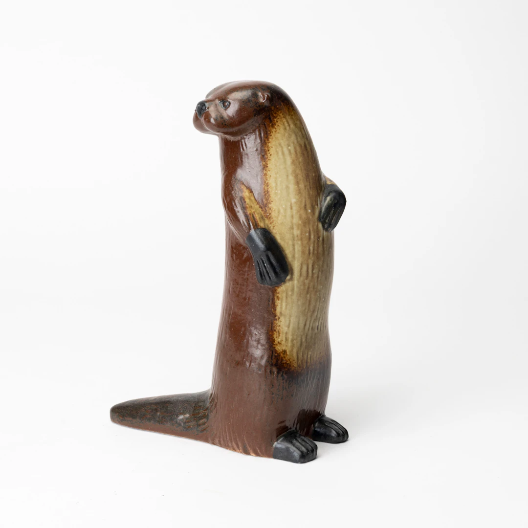 LISA LARSON. "Utter", 1980, edition 2500, stengods ur serien Utrotningshotade