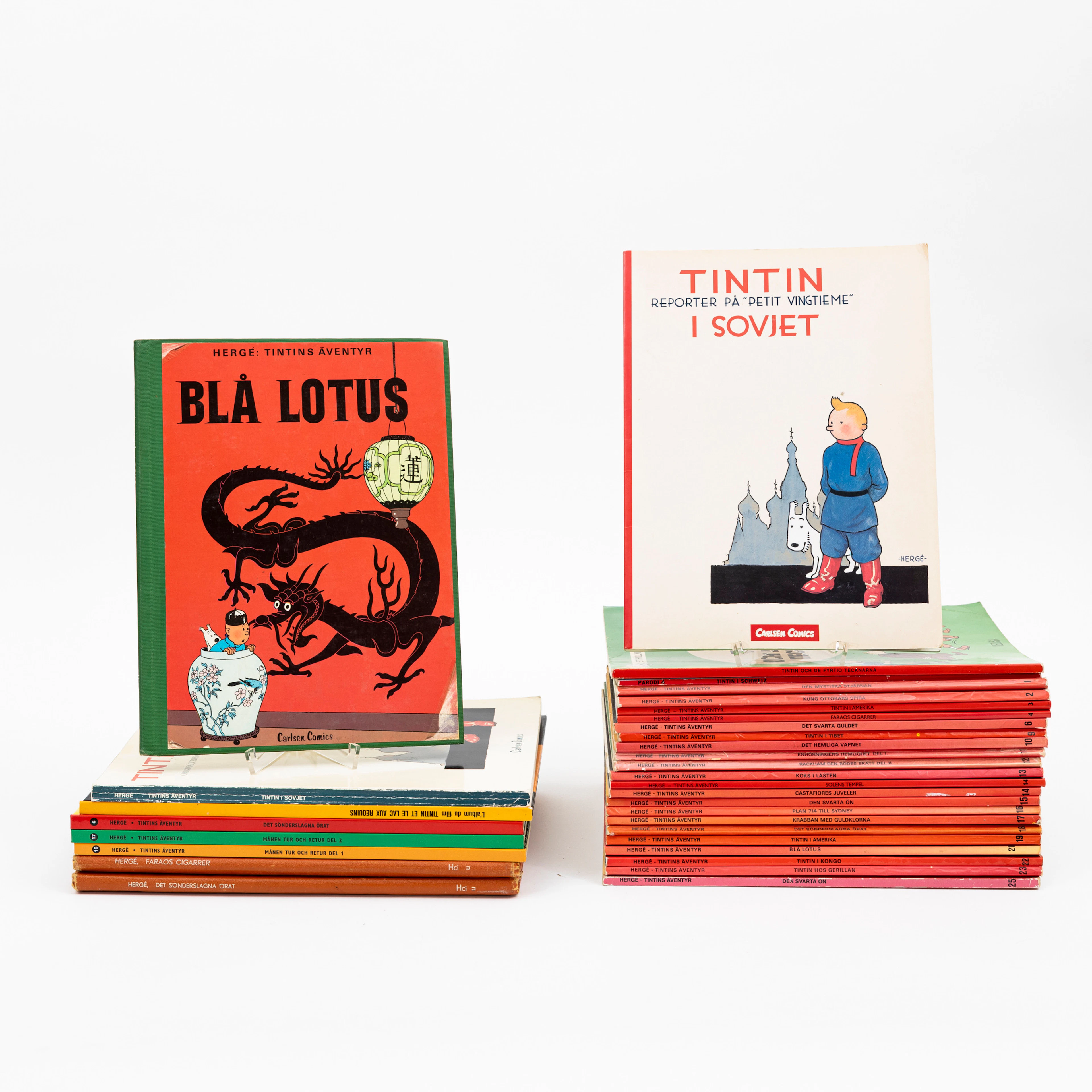 TINTIN, 32 st seriealbum, svenska samt en fransk, olika årgångar och