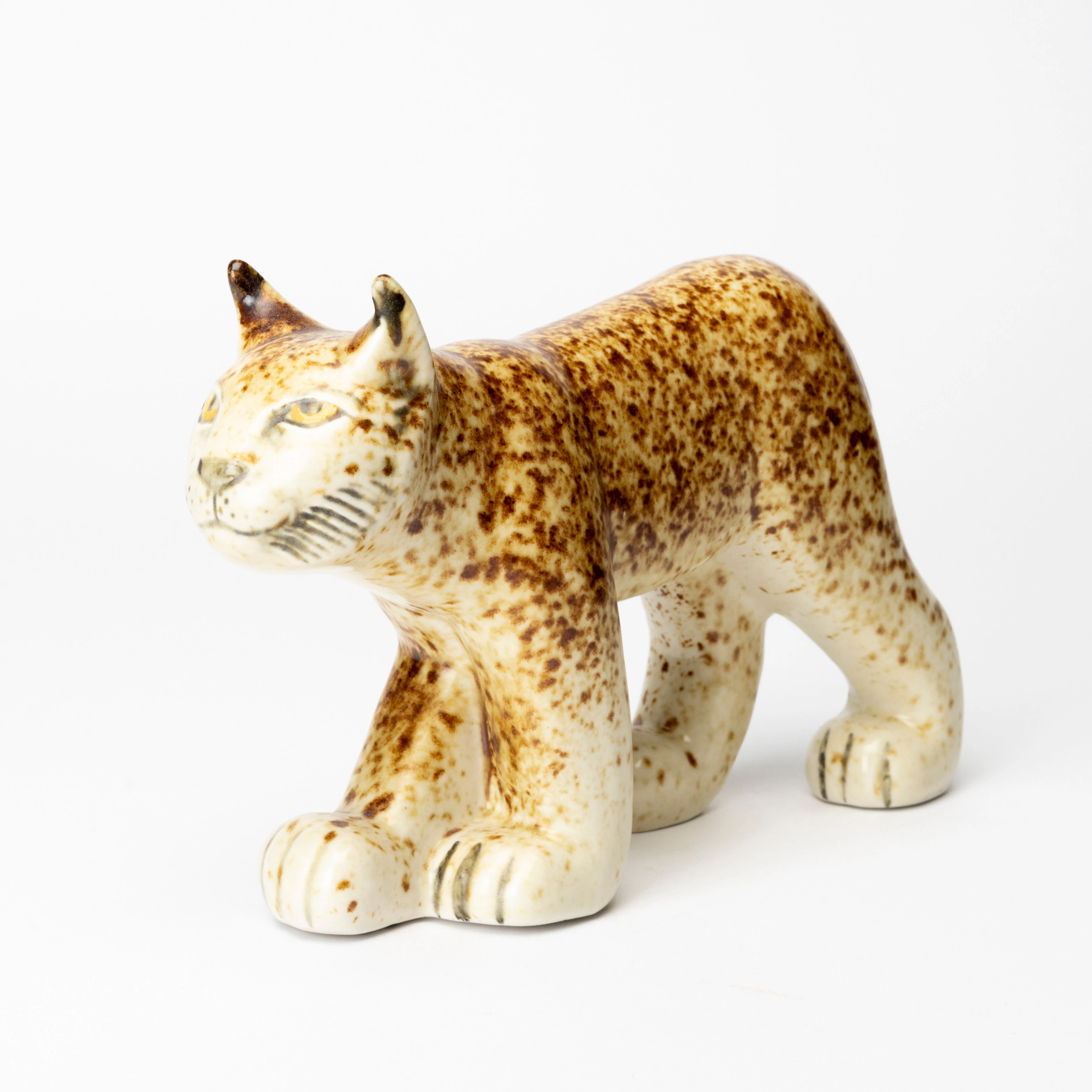 LISA LARSON. "Lodjur", 1980, edition 3000, stengods ur serien Utrotningshotade