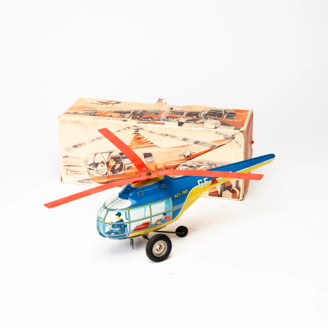 TECHNOFIX, helikopter, modell nr 273, litograferad plåt, urverk, med