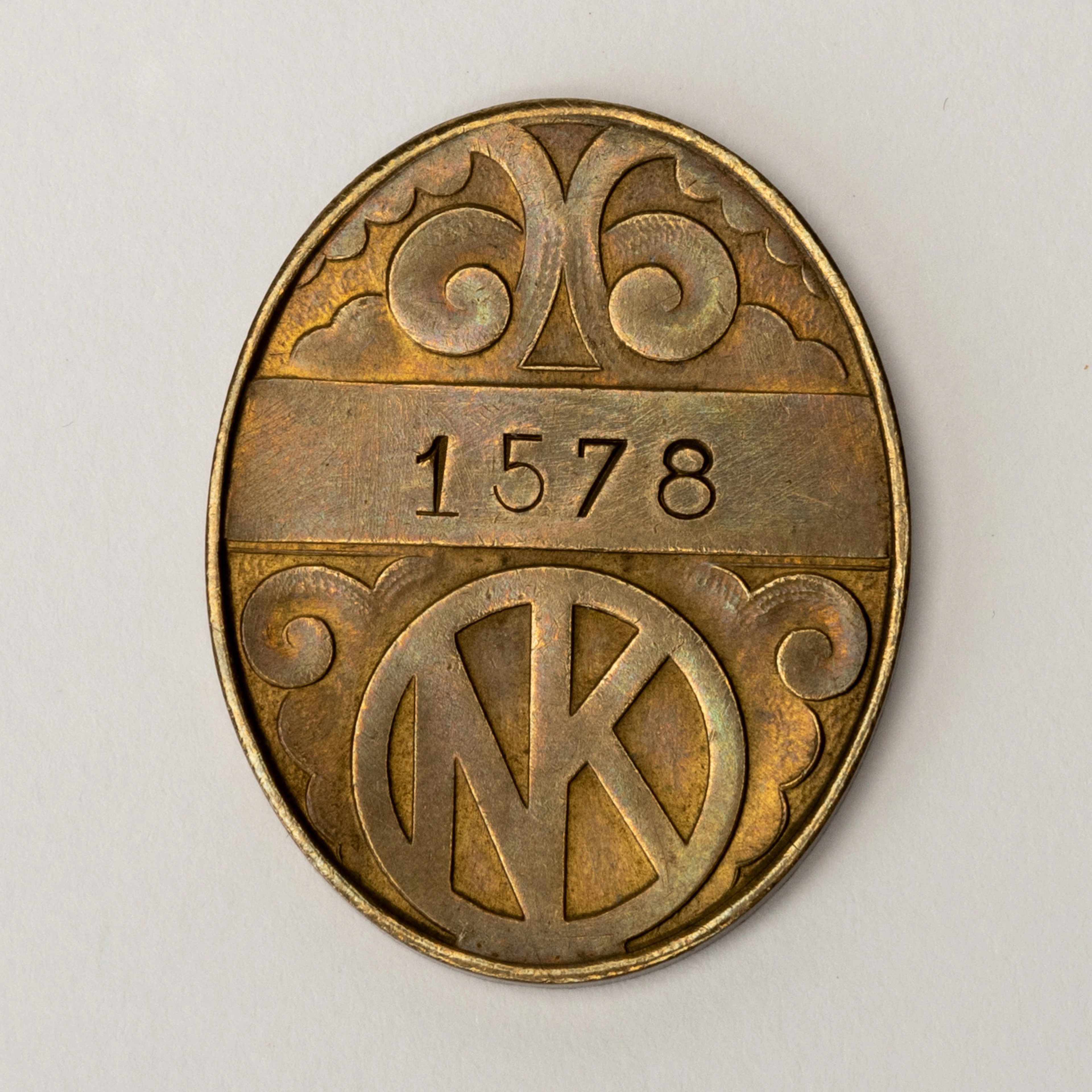 KREDITBRICKA, Sveriges första kredikort, brons, numrerad 1578, NK, 1920-tal.