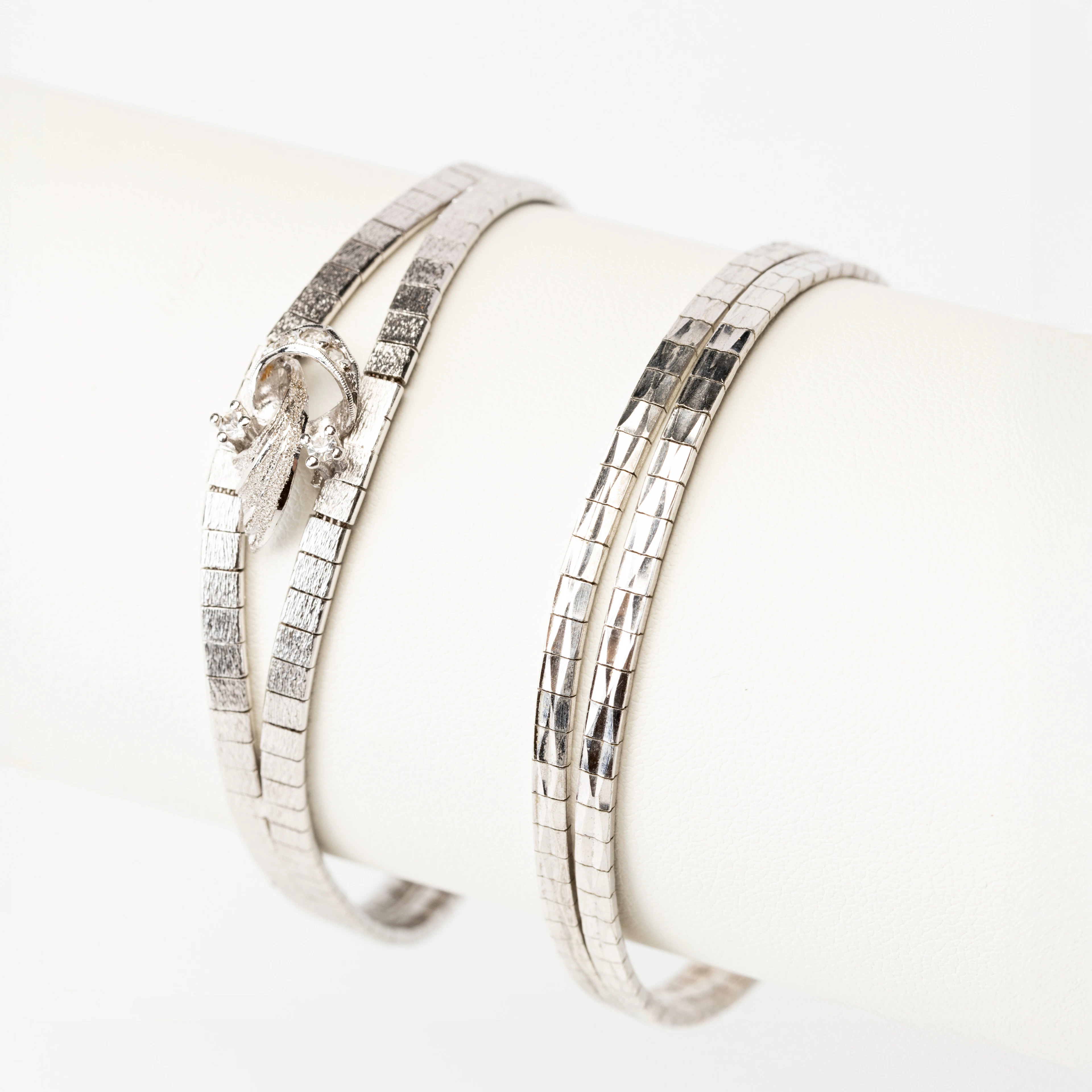 ARMBAND, 2 st, sterling silver, ett med vita stenar, Italien.