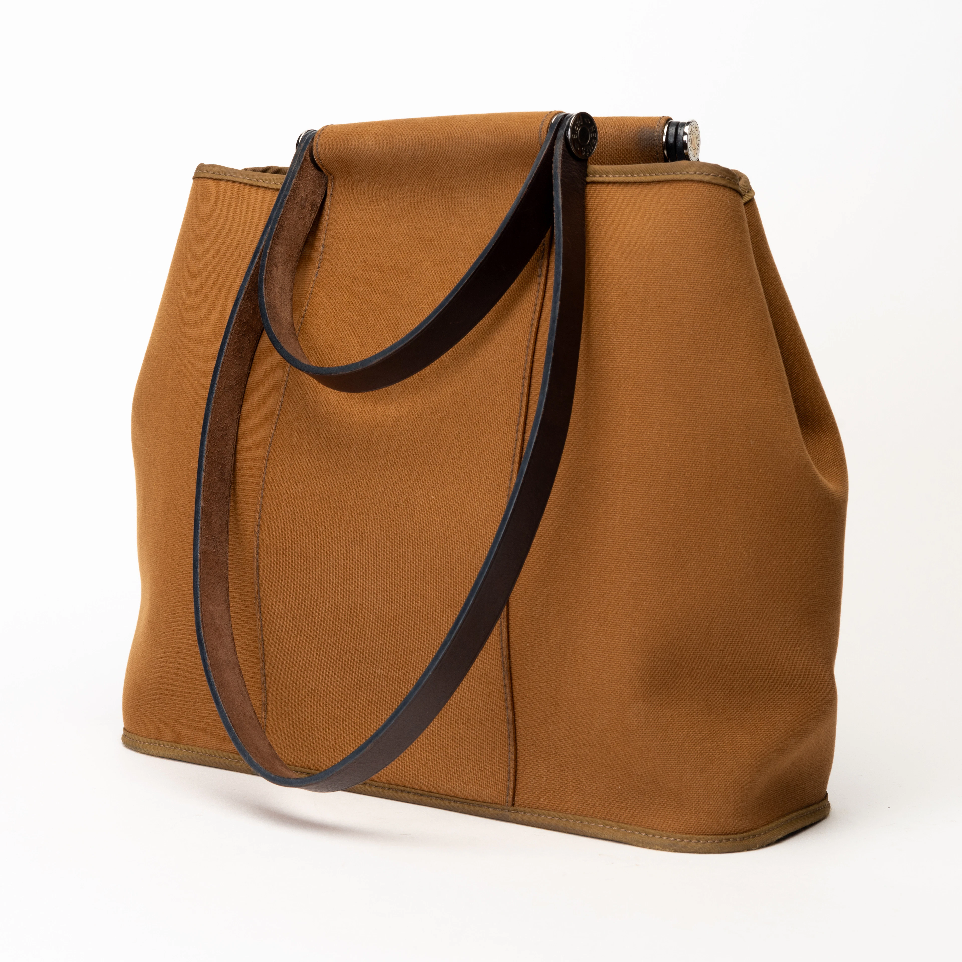 HERMÈS. Väska, brun canvas, "Cabag", handtag i brunt läder, Paris