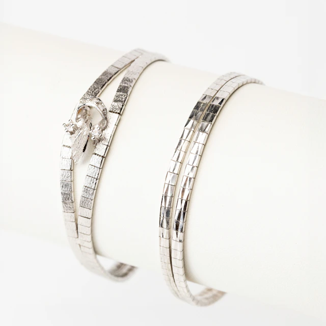ARMBAND, 2 st, sterling silver, ett med vita stenar, Italien.