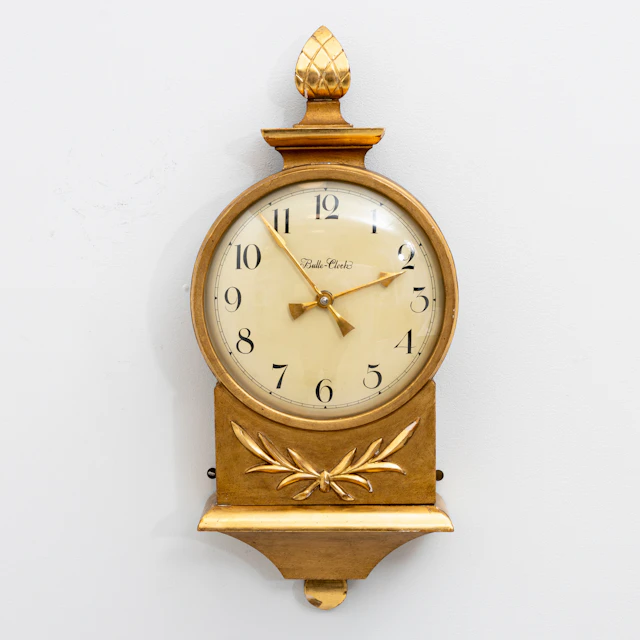 CARL MALMSTEN. Väggur, förgyllt, "Bulle-Clock, modell SM2 för Nordiska