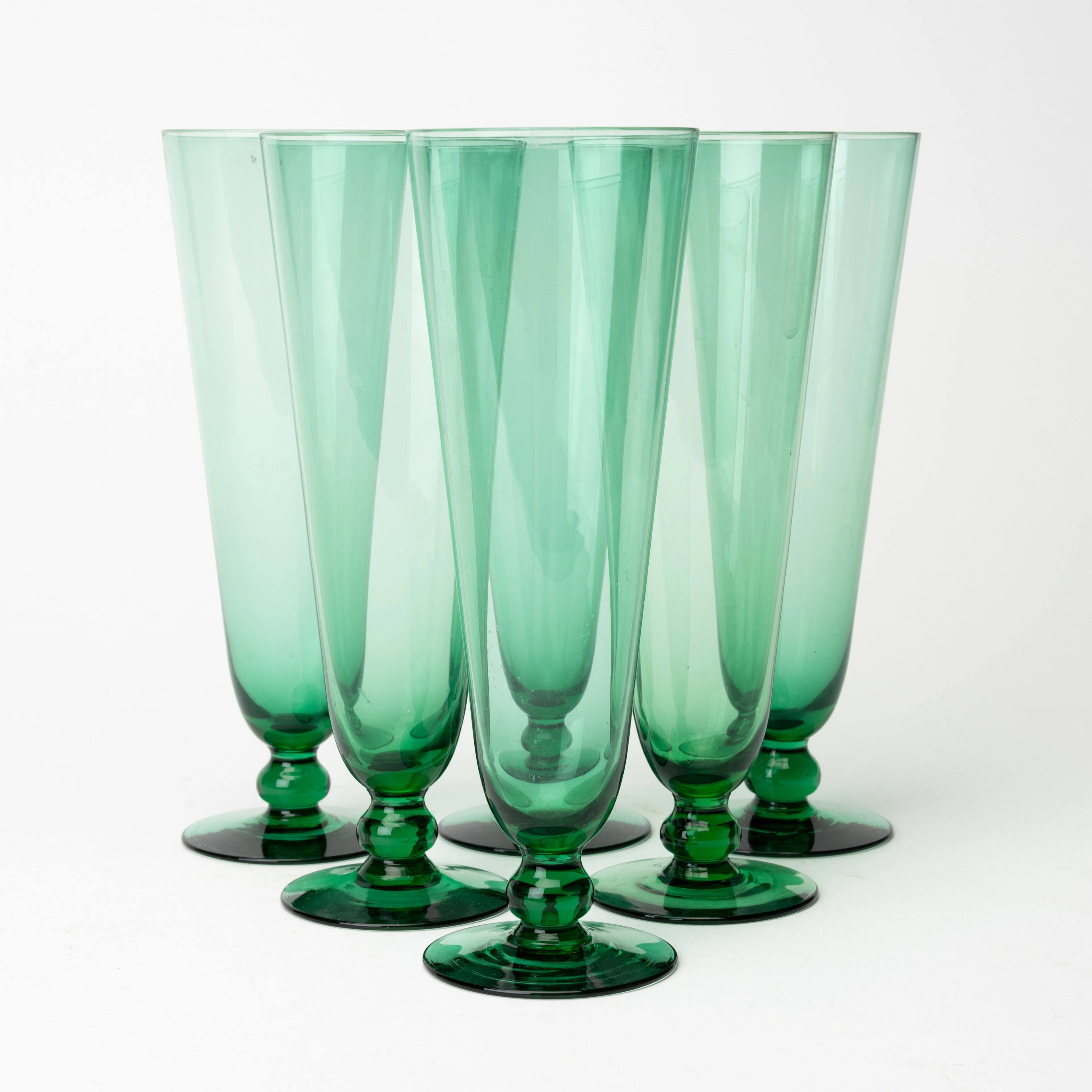 BJÖRN TRÄGÅRDH (1908-98). Champagneglas, 6 st, gröntonat glas, Reijmyre