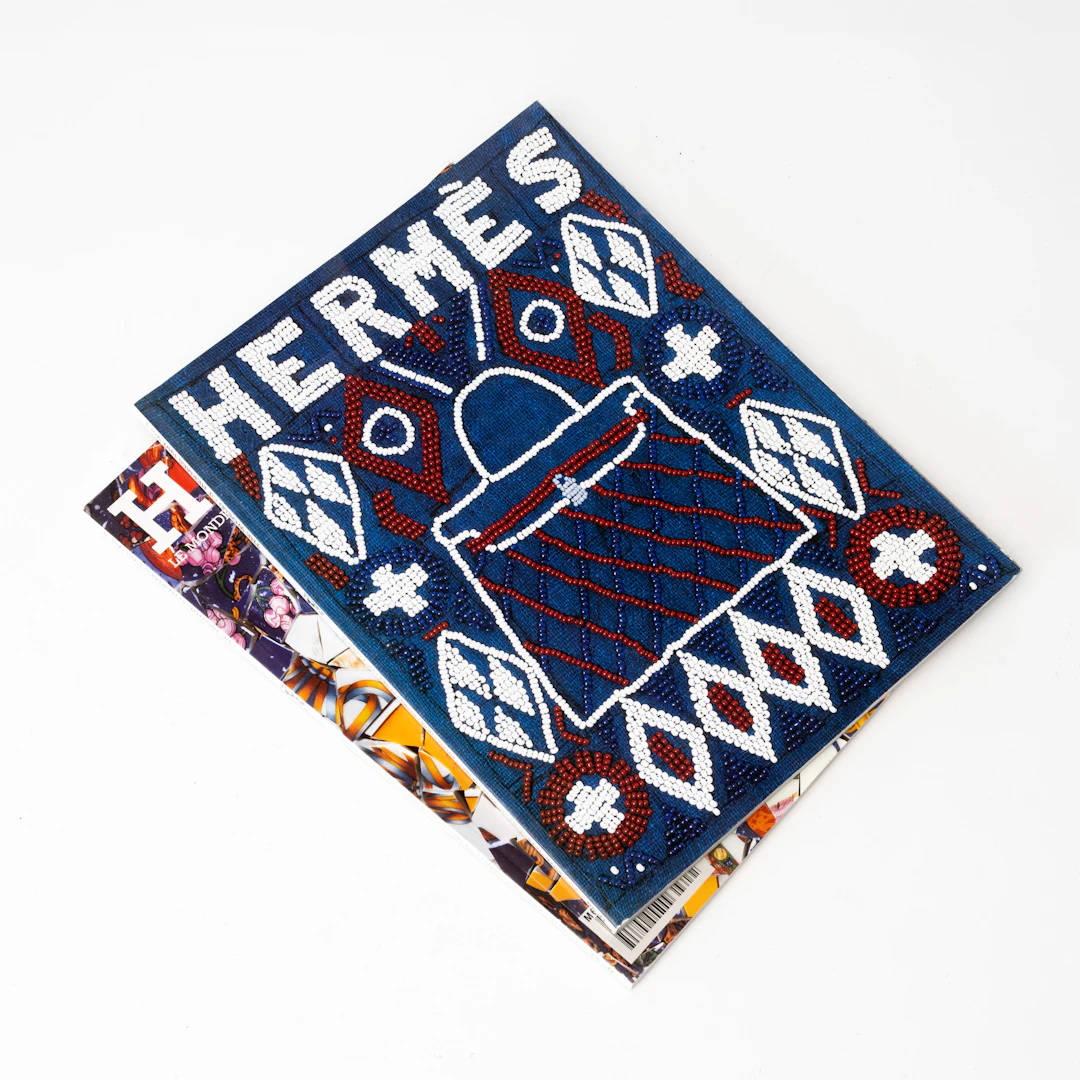 HERMÈS. Produktkataloger, 2 st, "The world of Hermès, 1997 Vol I samt