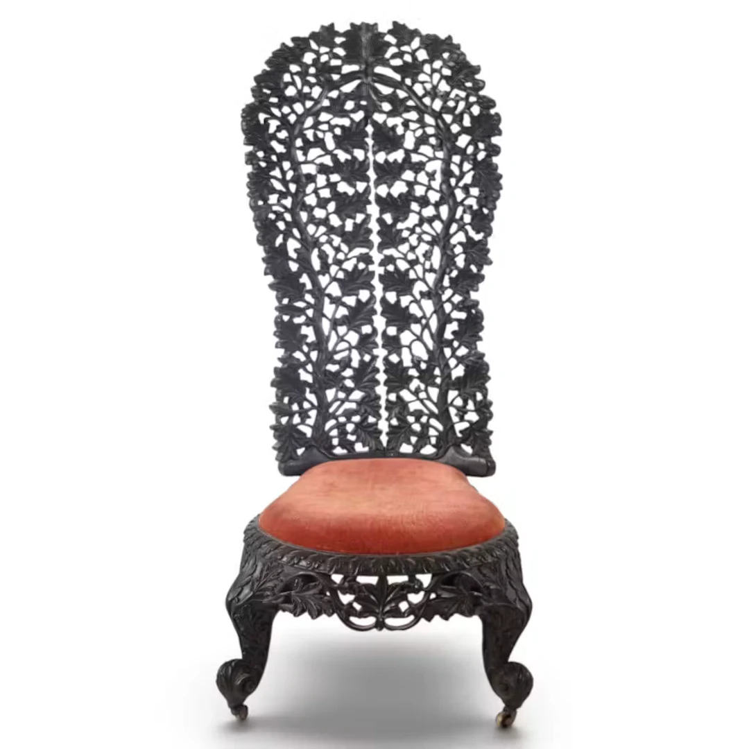 Lot 98: Anglo-Indian Carved Hardwood Slipper Chair