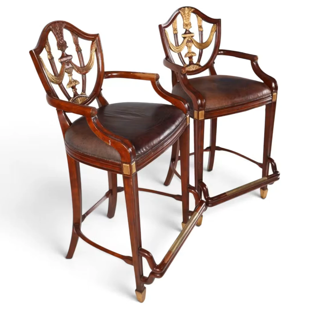 Lot 30: Pair Parcel-Gilt Shield-Back Bar Stools