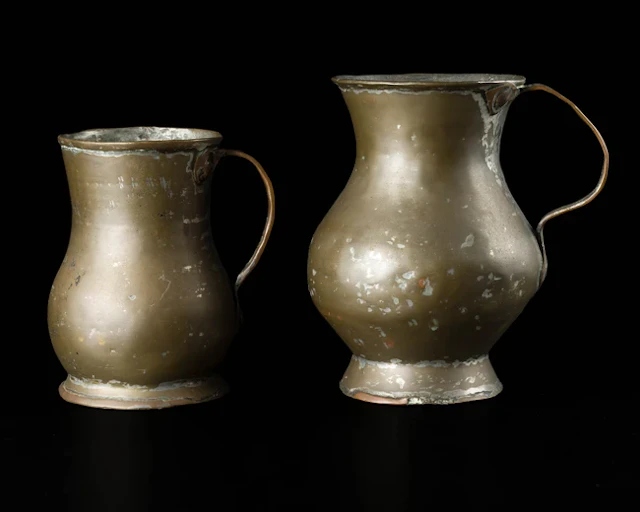 Two plain tankards