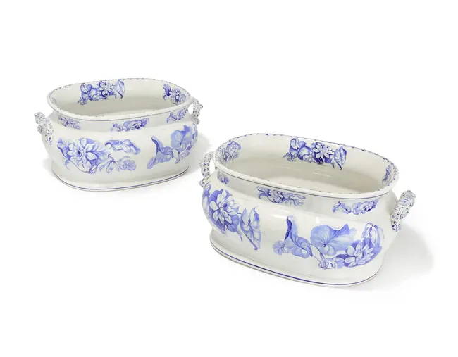 A pair of Victorian Staffordshire earthenware two-handled footbaths