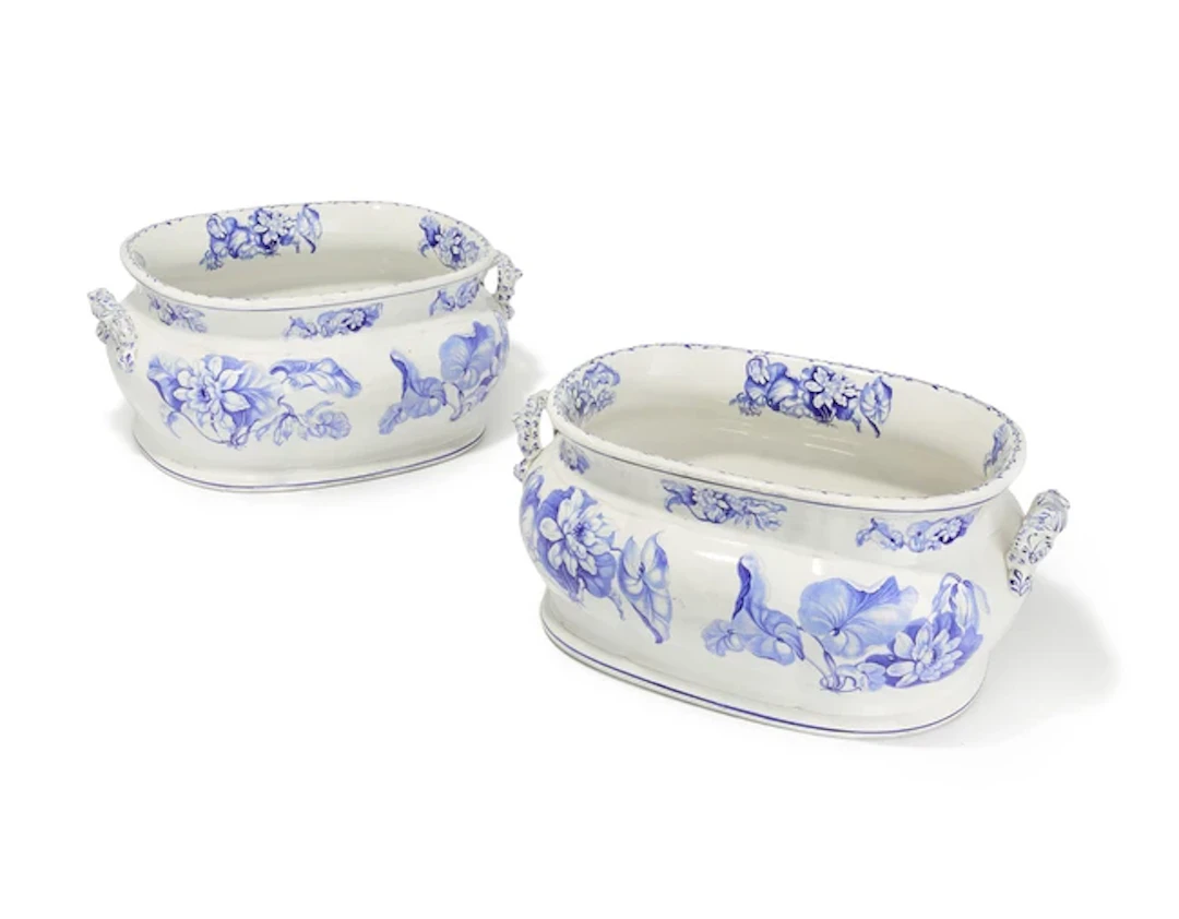 A pair of Victorian Staffordshire earthenware two-handled footbaths