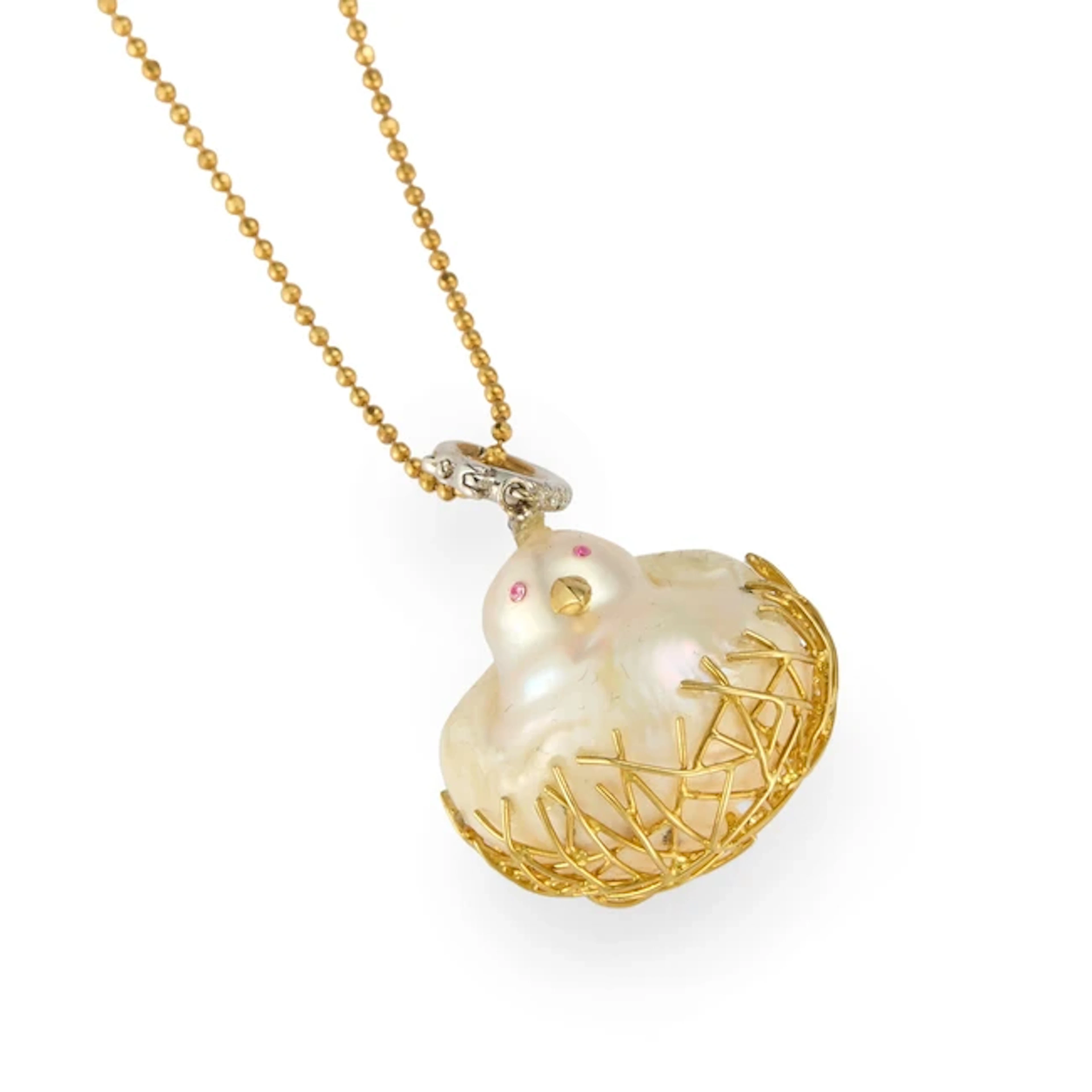 A cultured pearl and diamond pendant