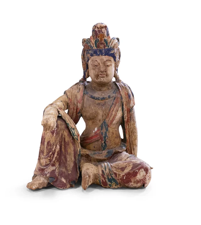 A Chinese polychrome painted wood figure of Guanyin Ming dynasty