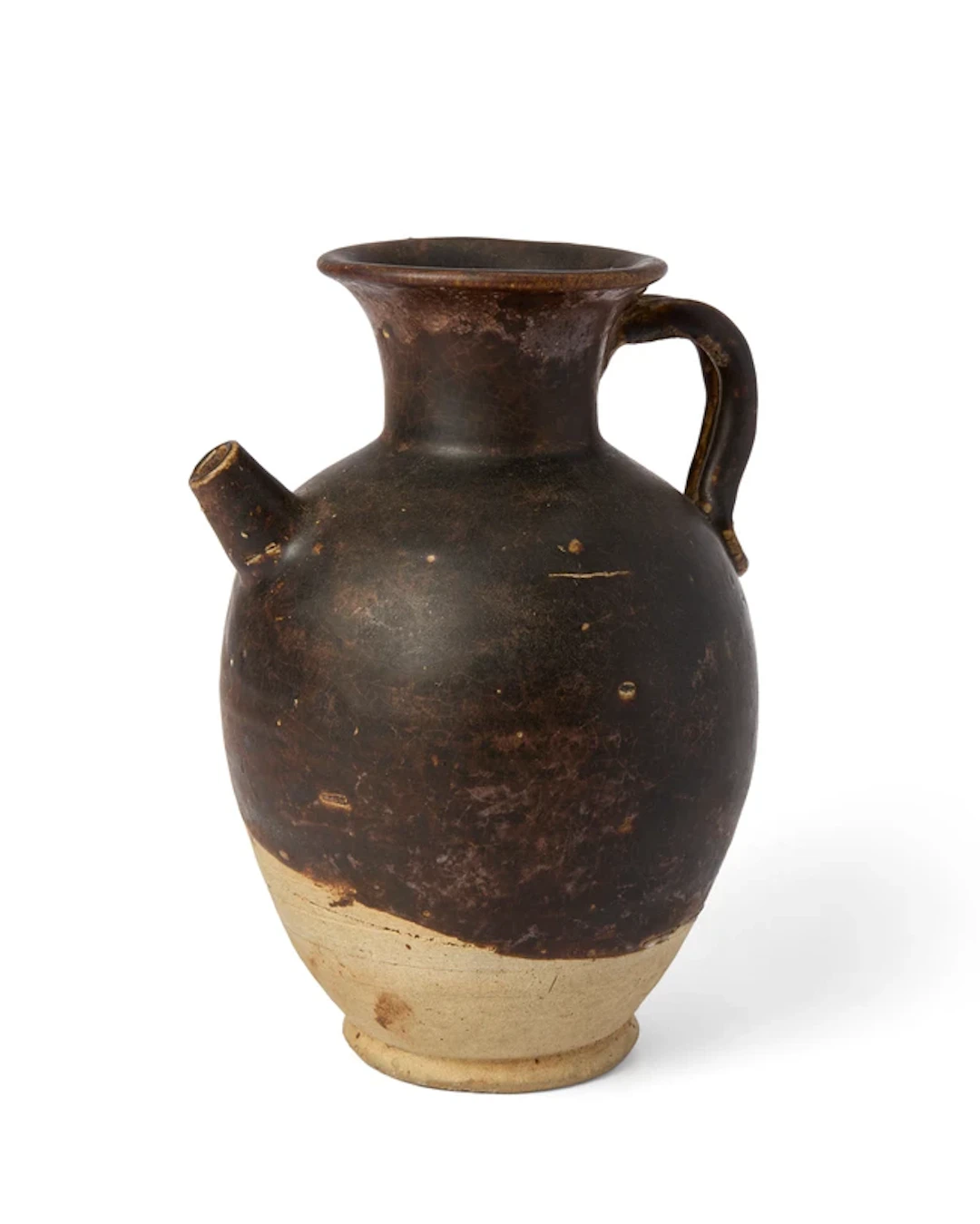 A Chinese brown-glazed ewer Song dynasty The oviform body set with a short