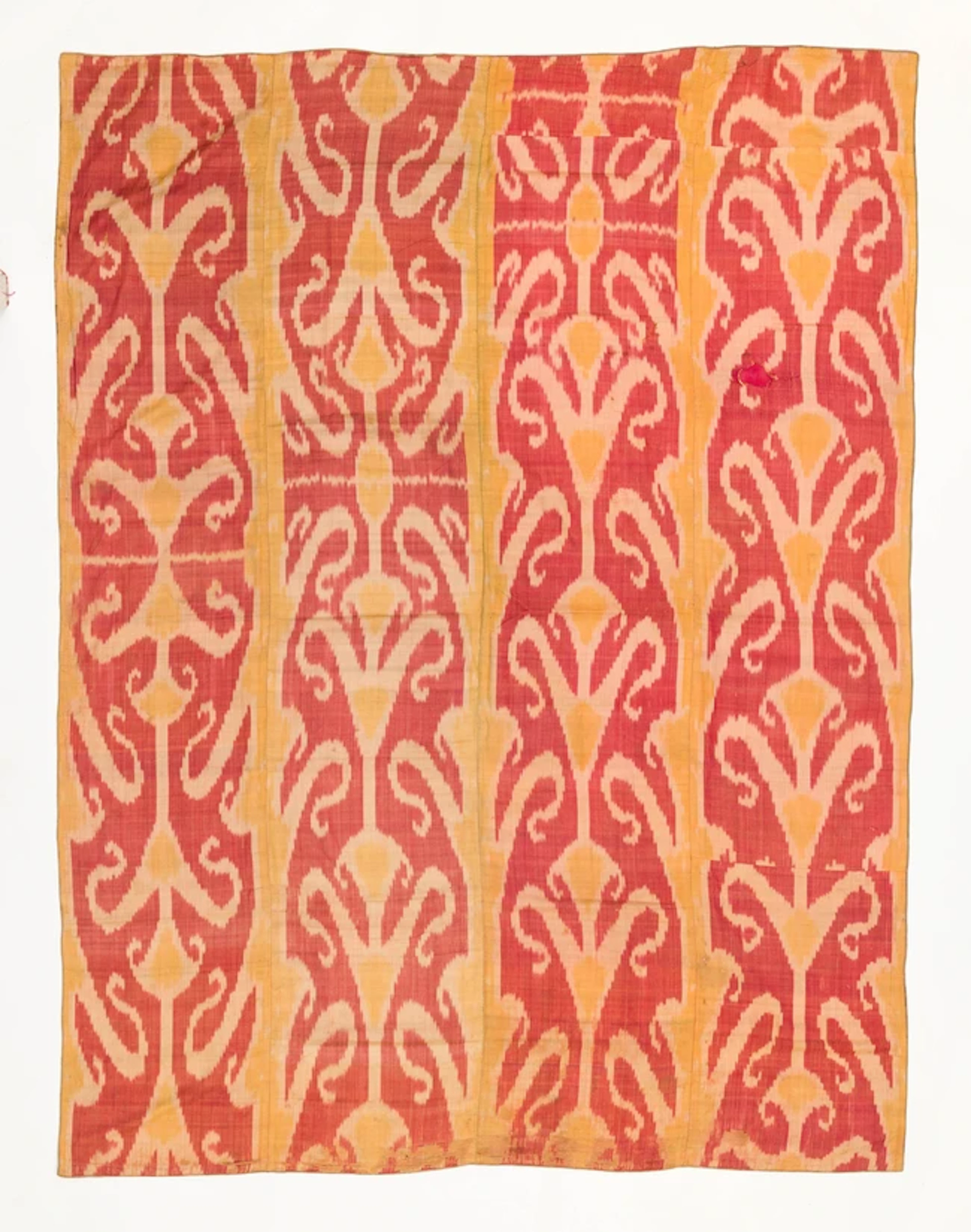 A red and yellow ikat panel