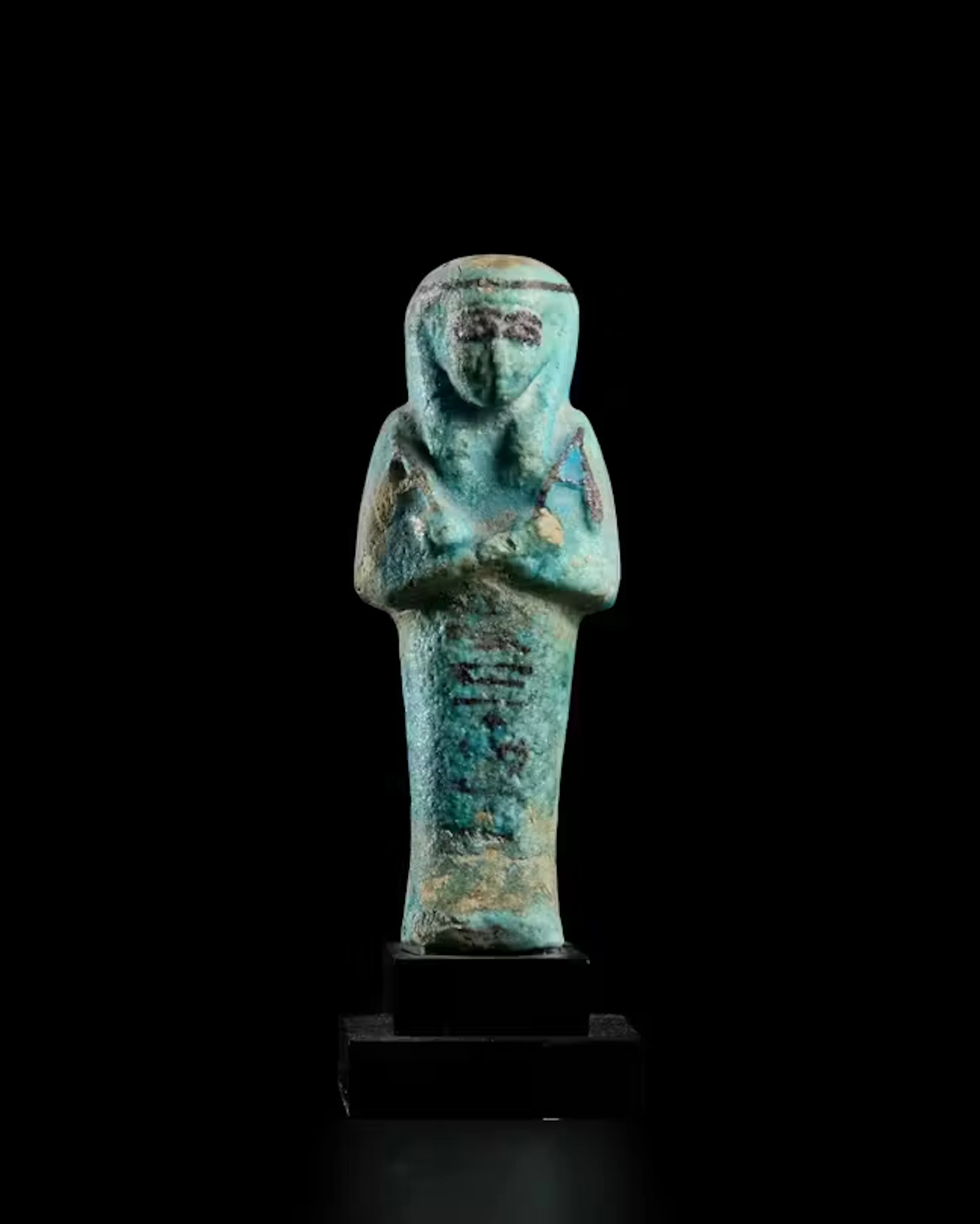 An Egyptian turquoise faience shabti