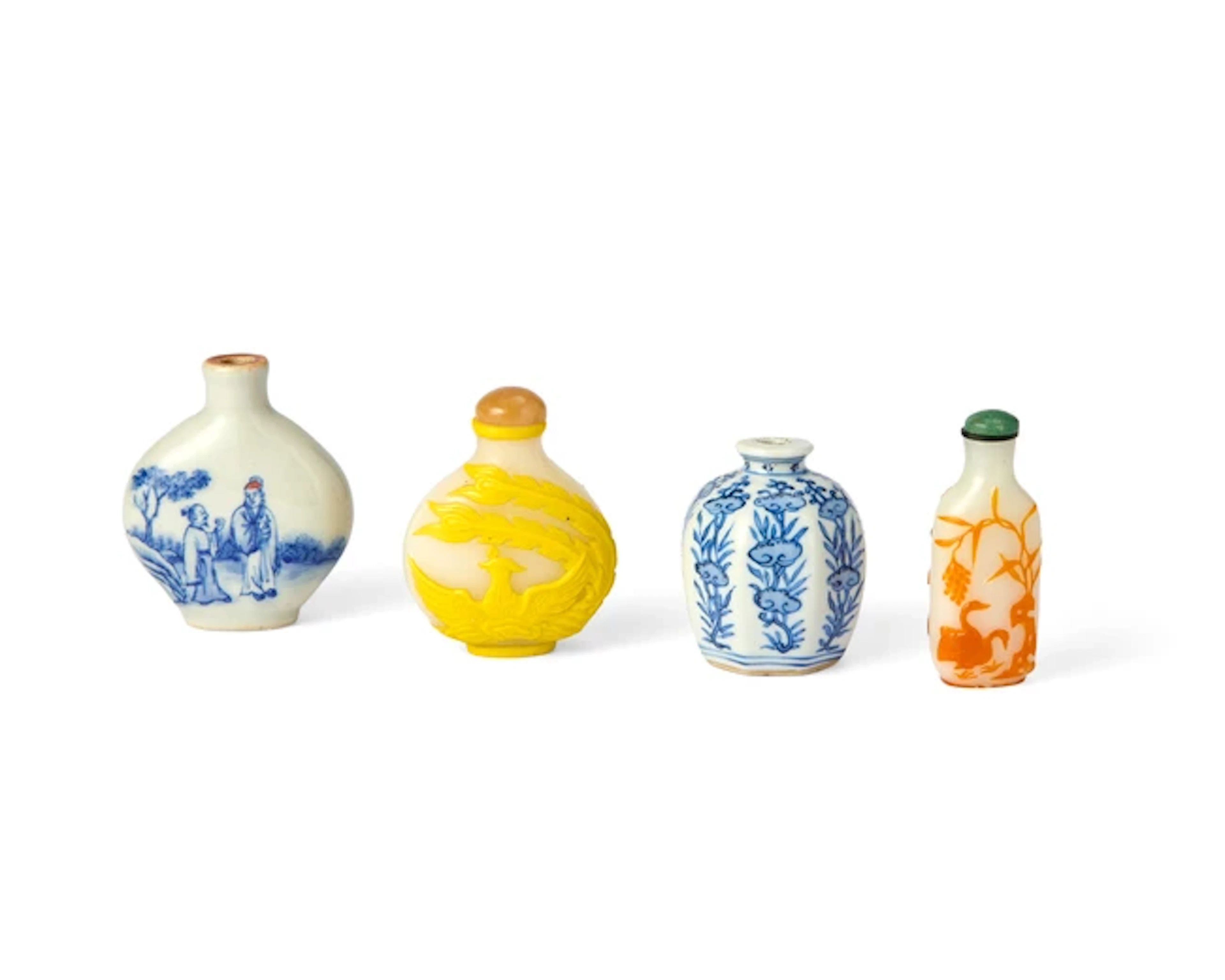 Four Chinese snuff bottles 20th century Comprising two...