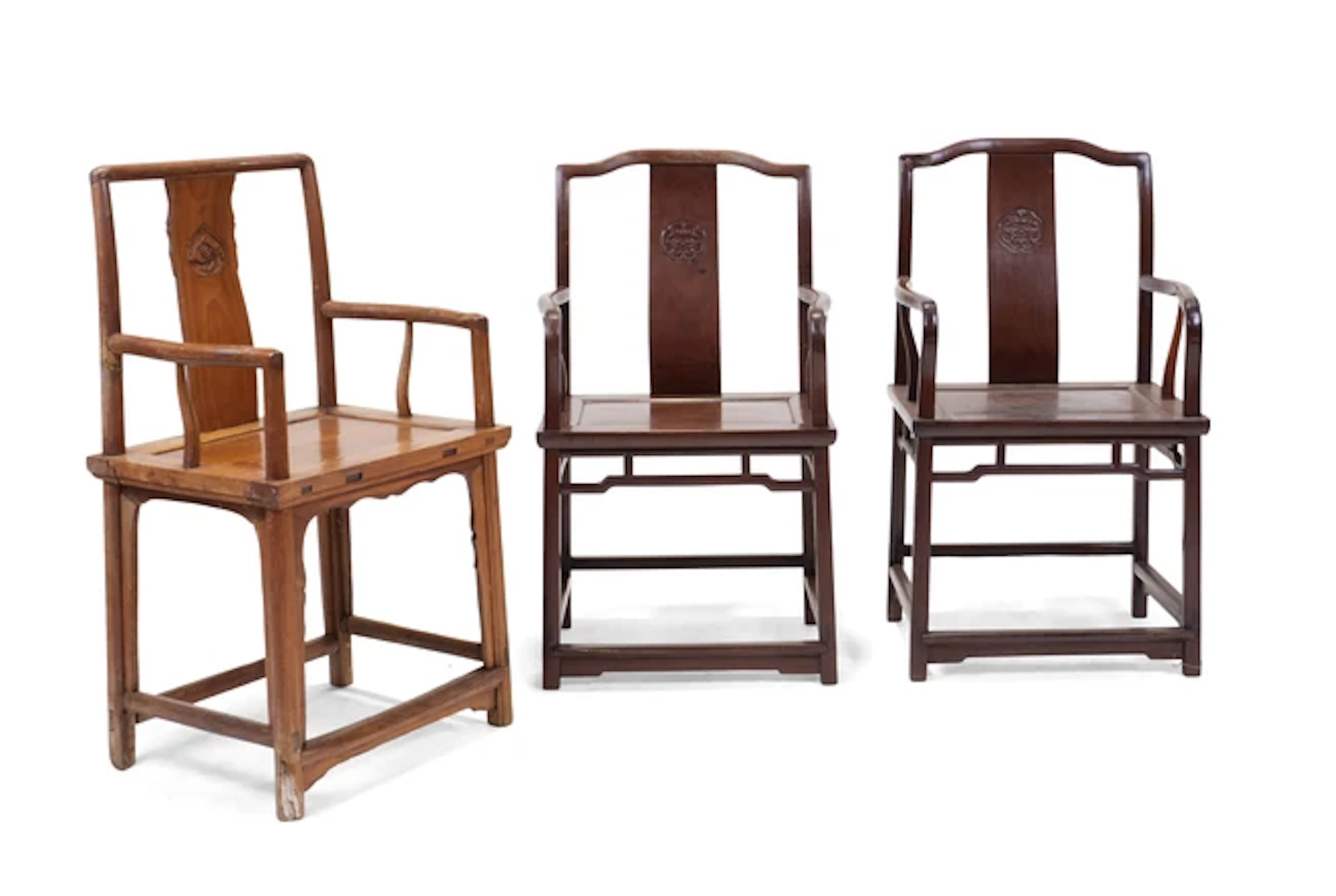 Three Chinese chairs 20th century Comprising: a pair of square member arm chairs
