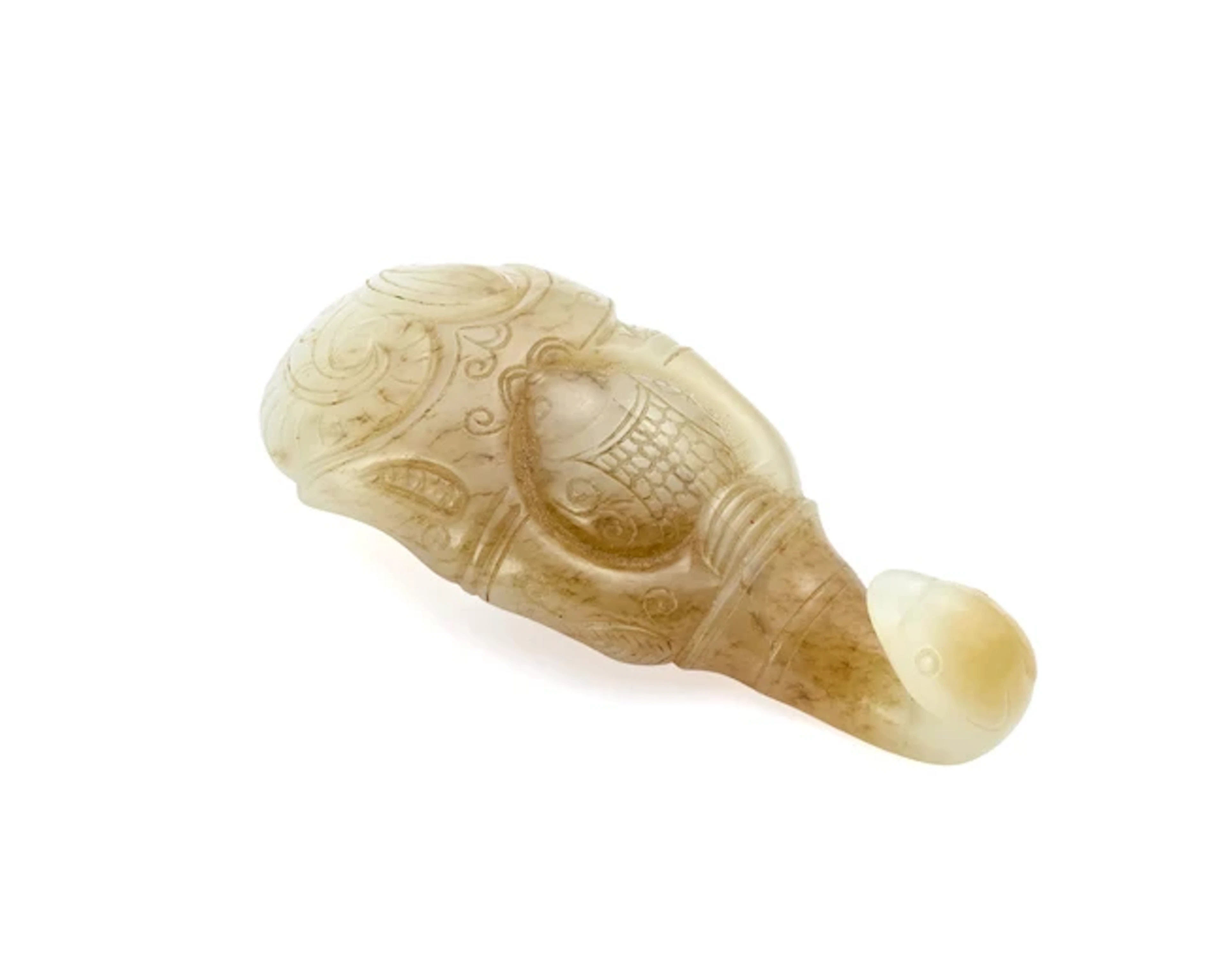 An unusual Chinese white and mushroom jade belt hook