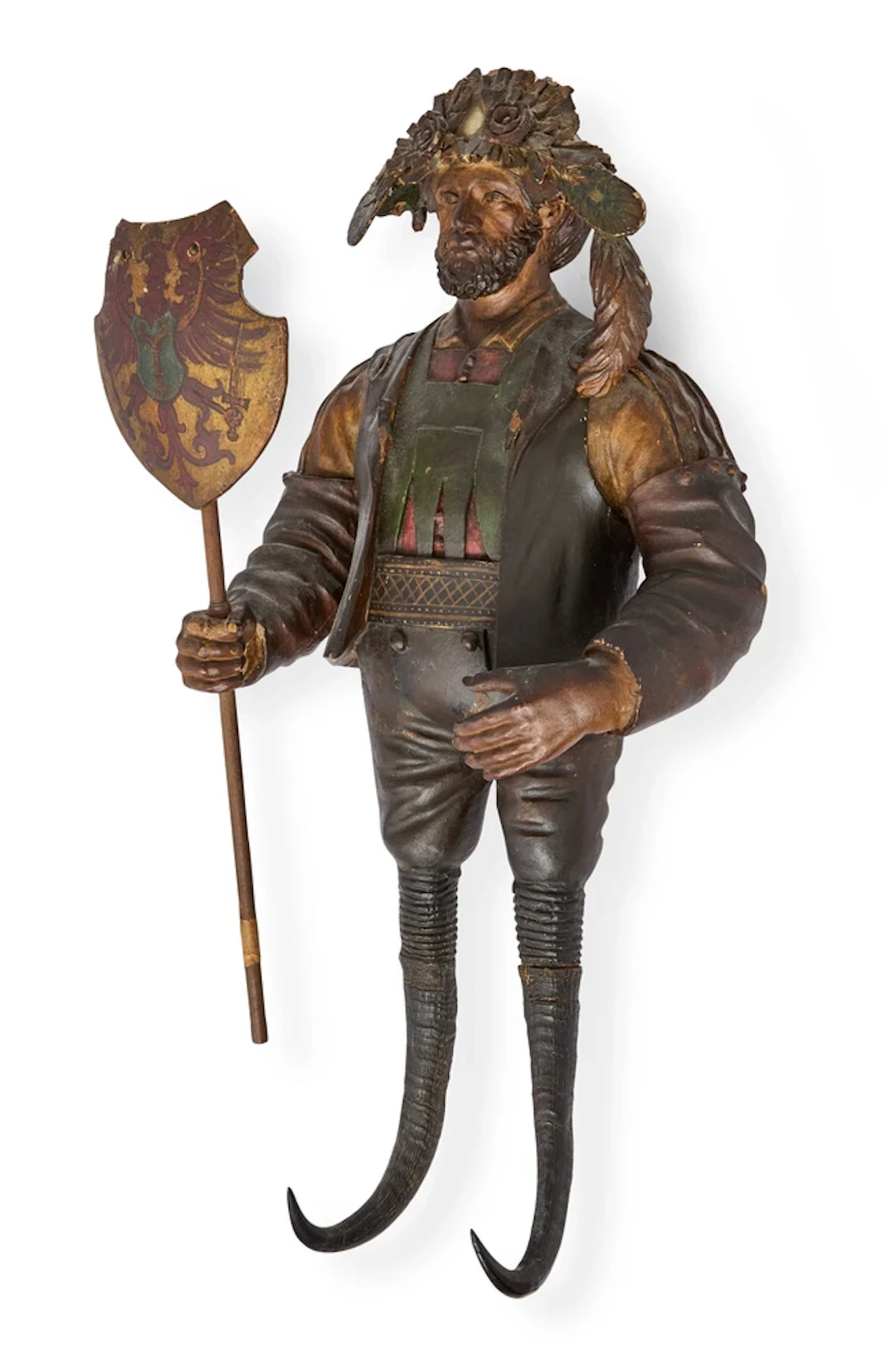 A Black Forest carved and polychromed wood figural coat hook