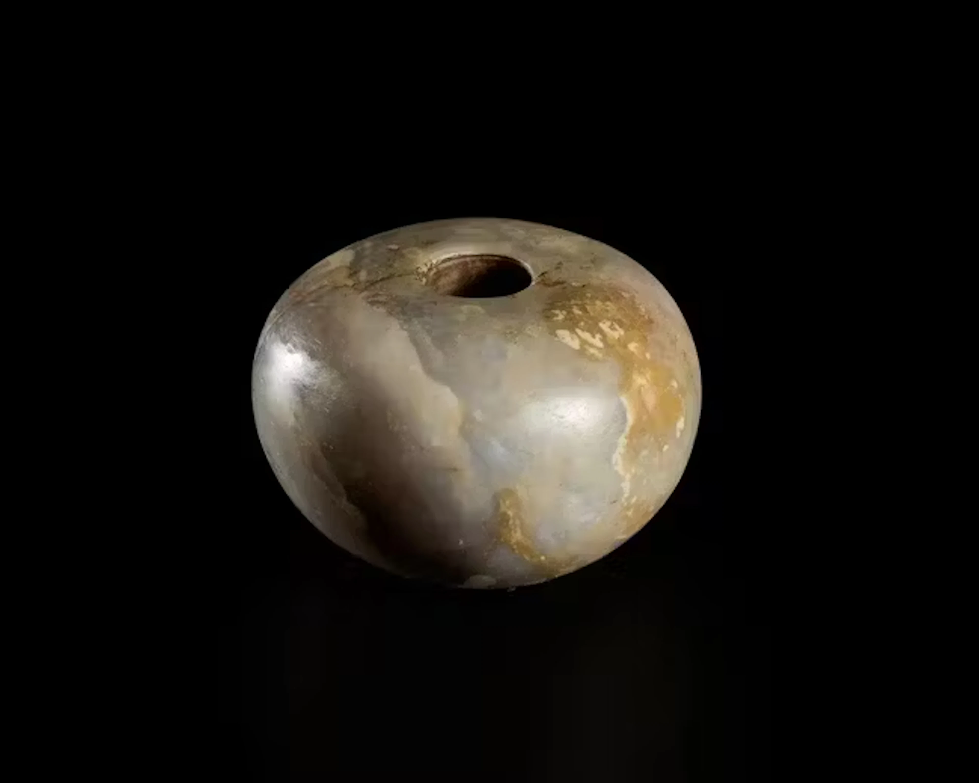 A Near Eastern alabaster mace head,Circa 3000 B.C