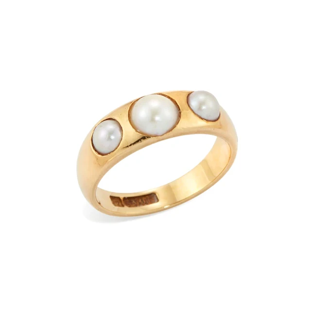 An early 20th century 18ct gold half-pearl ring