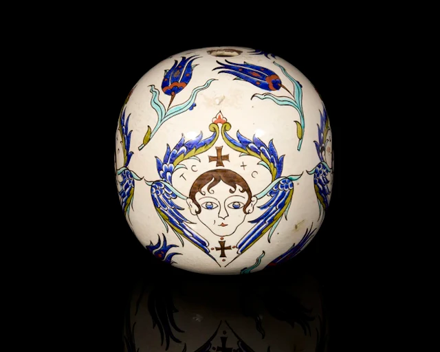 An ovoid pottery hanging ornament