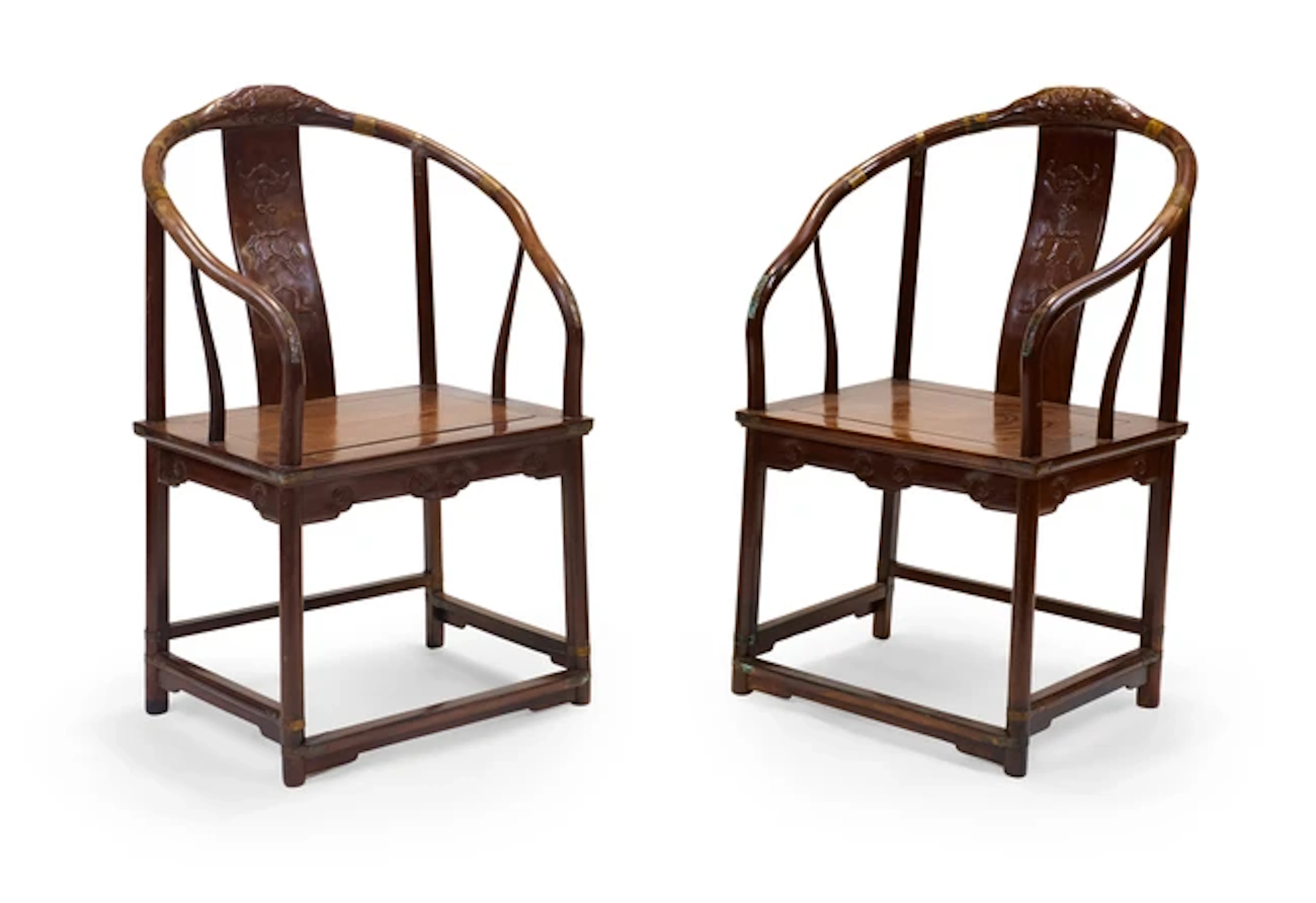 A pair of Chinese hongmu horseshoe back armchairs Late...