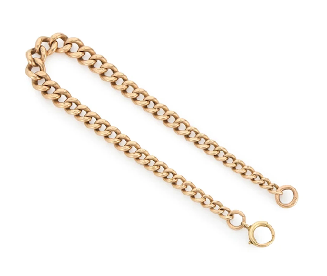 An early 20th century 9ct gold graduated curb link bracelet
