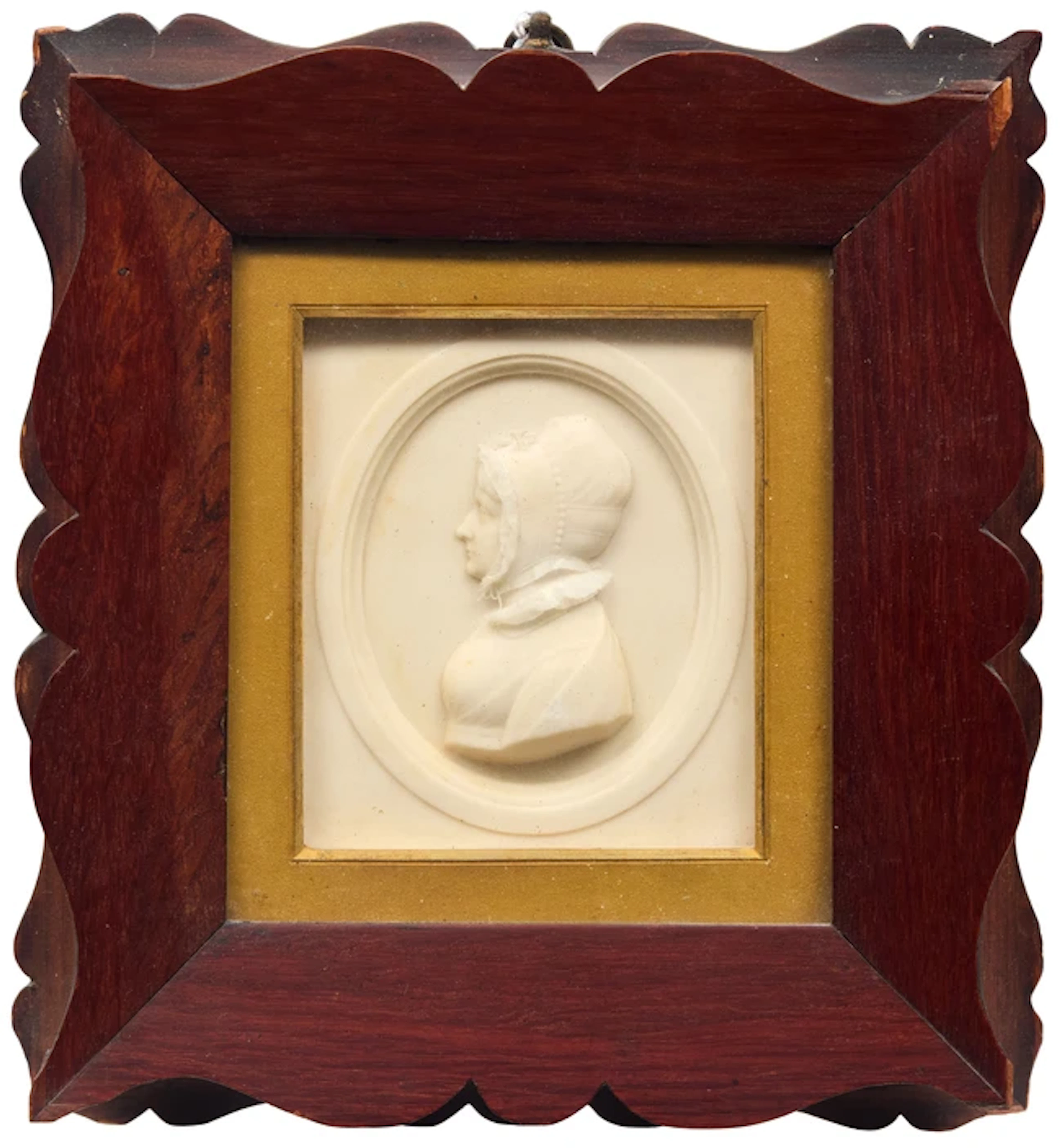An English wax portrait profile of Mrs Thomas Bignold...