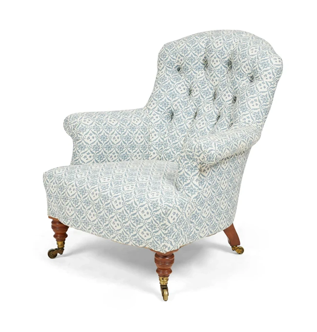 A Victorian Howard & Sons walnut easy armchair