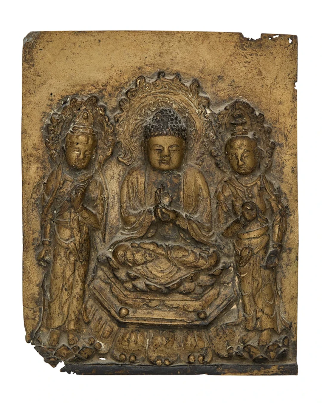 A Chinese gilt bronze 'Buddhist triad' plaque Tang...