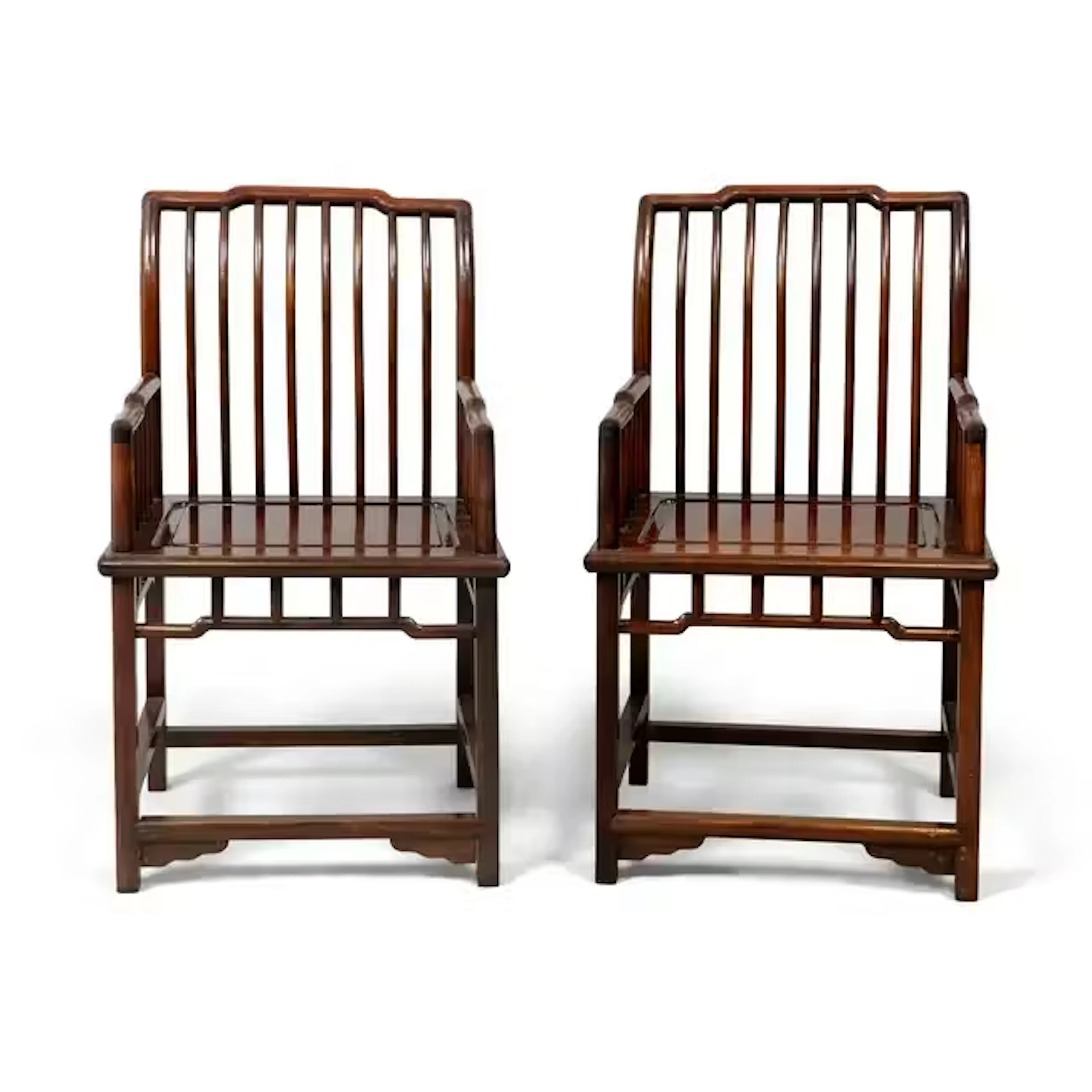 A pair of Chinese huanghuali Ming-style spindle-back armchairs