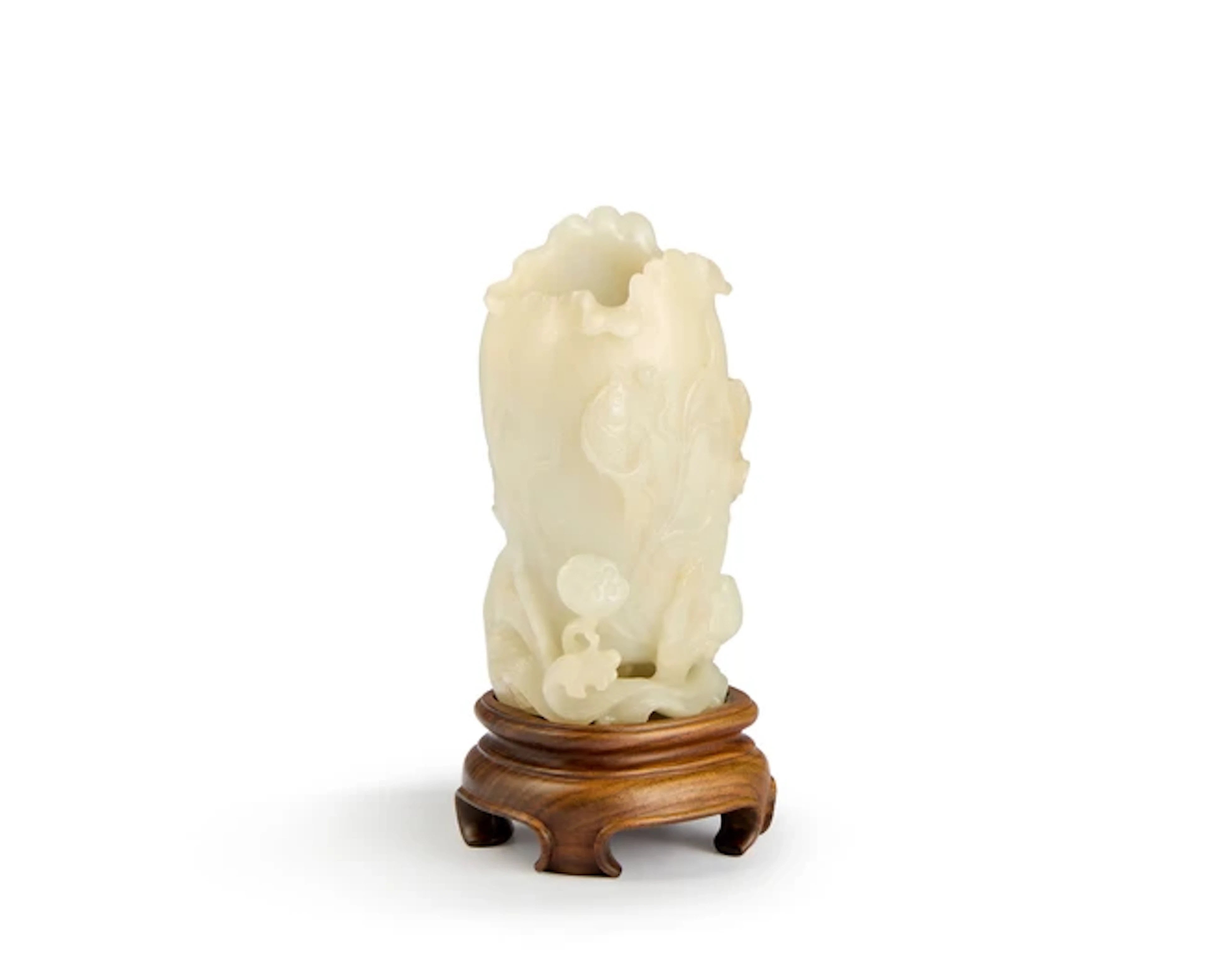 A Chinese white jade 'lotus' vase Late Qing dynasty...