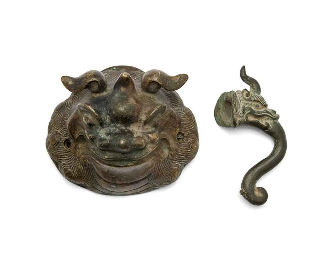 Two Chinese mythical beast bronze handles 17th/18th...