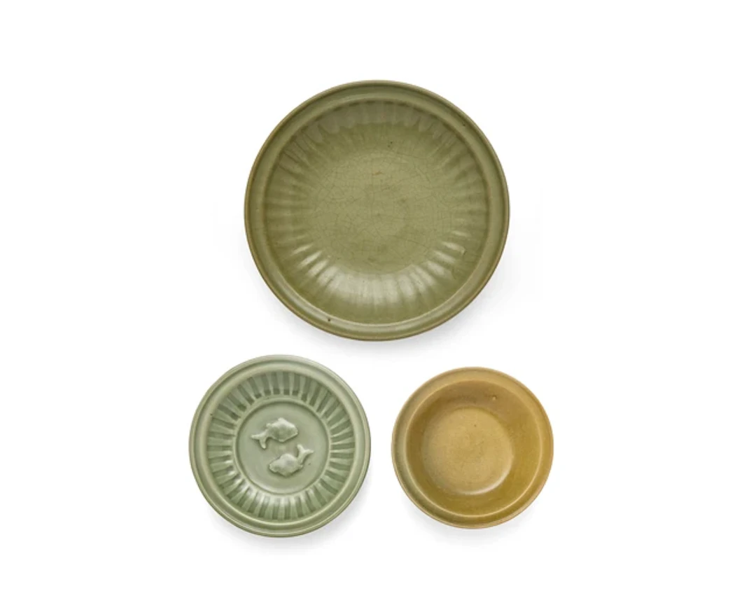 Three Chinese Longquan celadon plates Ming dynasty and...