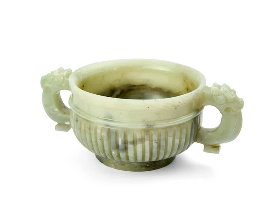 A large Chinese celadon and grey jade incense burner