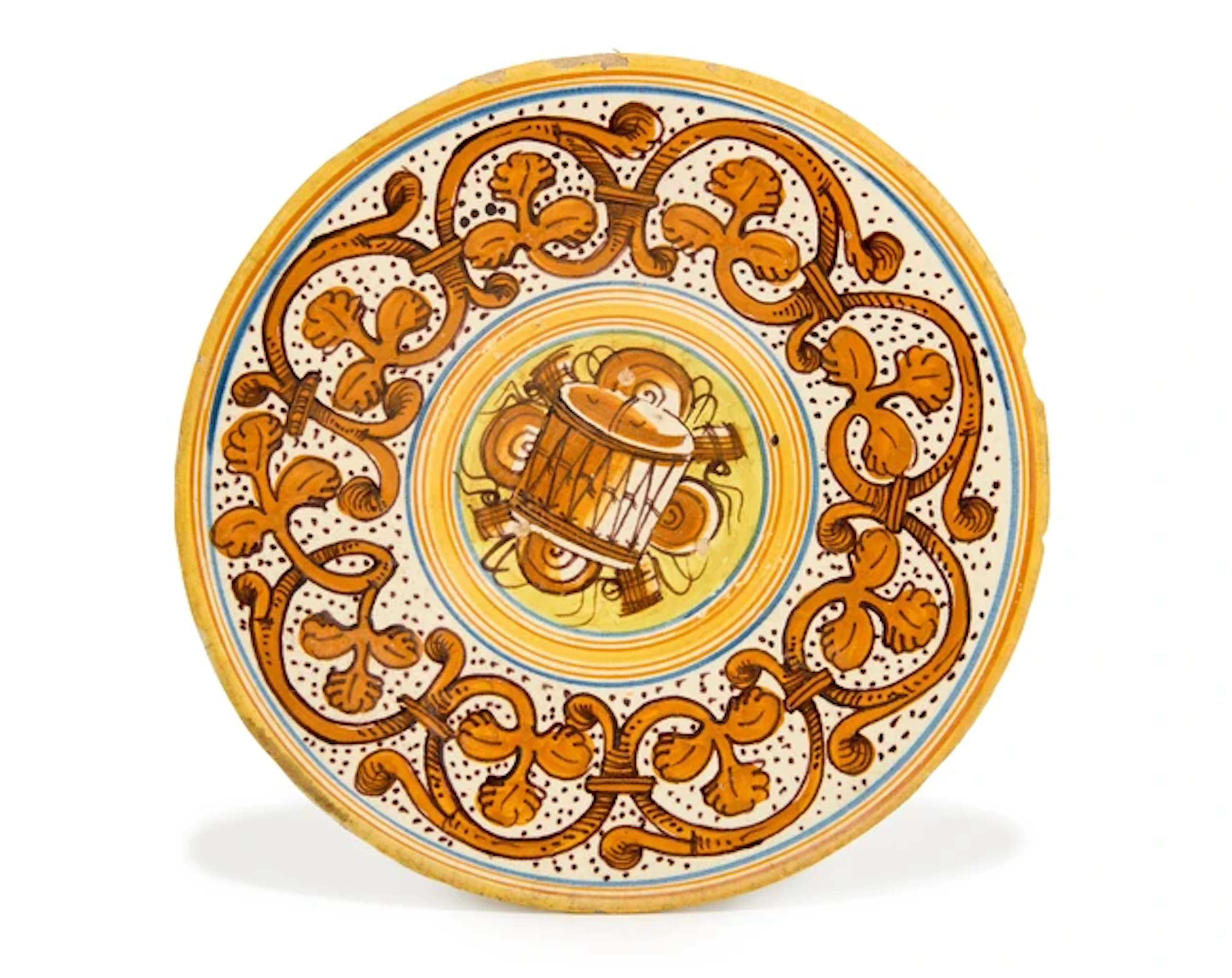 An Italian glazed terracotta footed dish