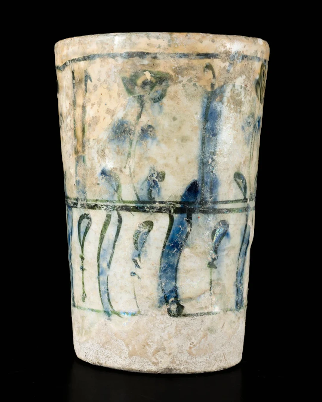 A Mamluk underglaze painted pottery beaker and unrelated fragment