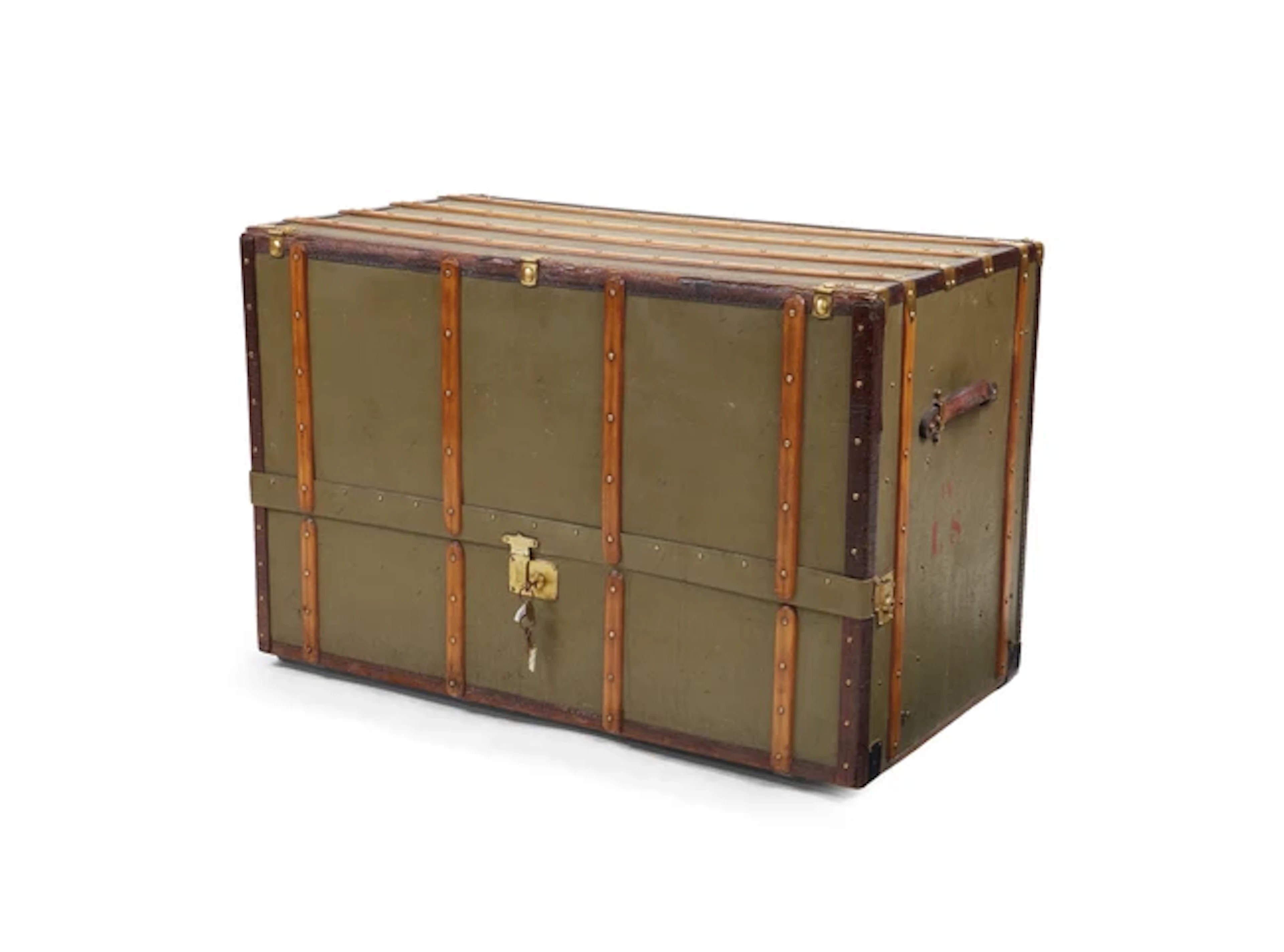 A canvas covered travelling trunk